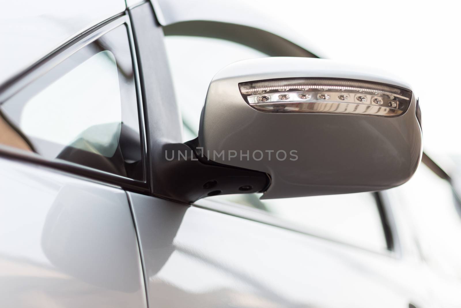 close up light on turn signal of car by blackzheep