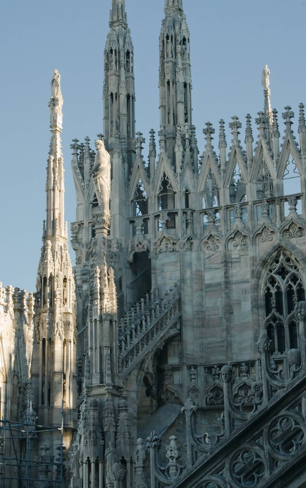 Silhouettes of statues on the roof of the Duomo in Milan