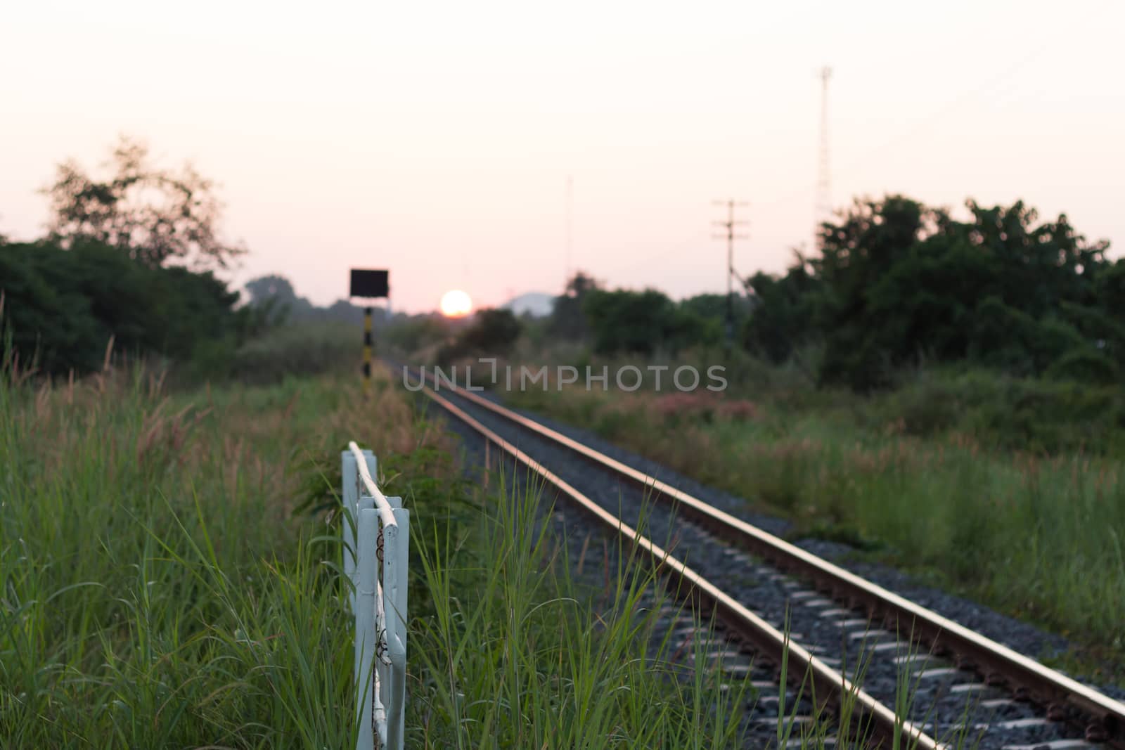 railway at sunset by blackzheep