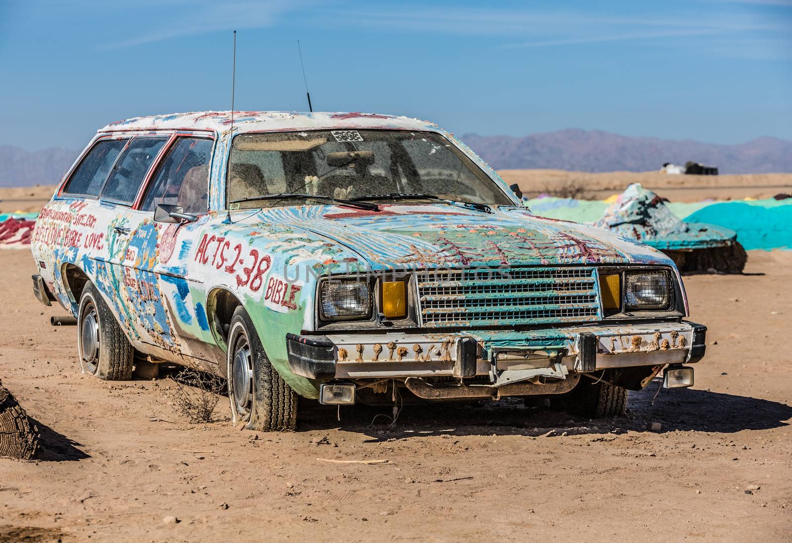 CALIPATRIA, IMPERIAL COUNTY, CALIFORNIA, USA - NOVEMBER 28: Bible car outsider art installation at Salvation Mountain on November 28, 2014 in at Calipatria, California, USA.