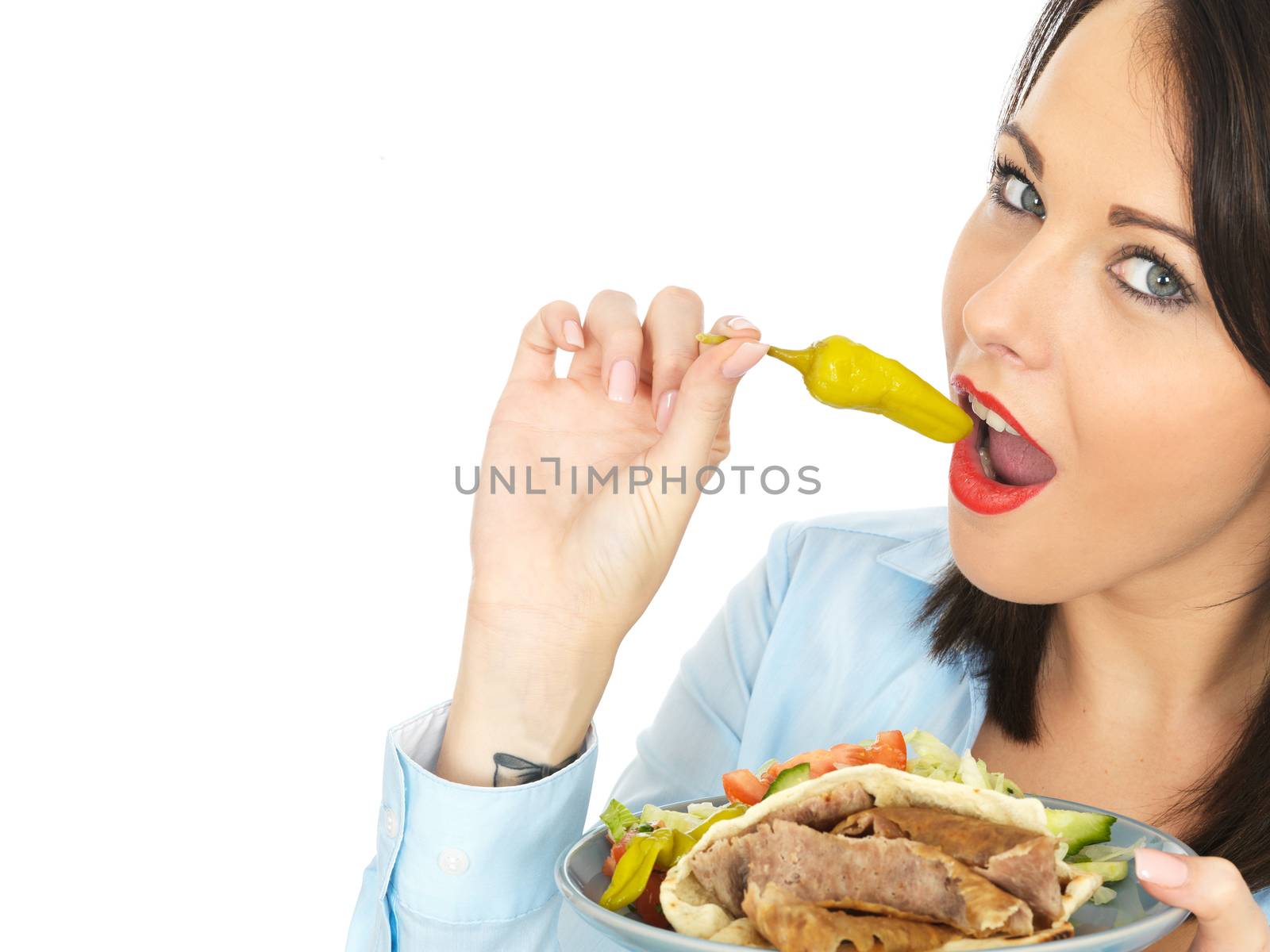 Attractive Young Woman Eating Donner Kebab with Salad