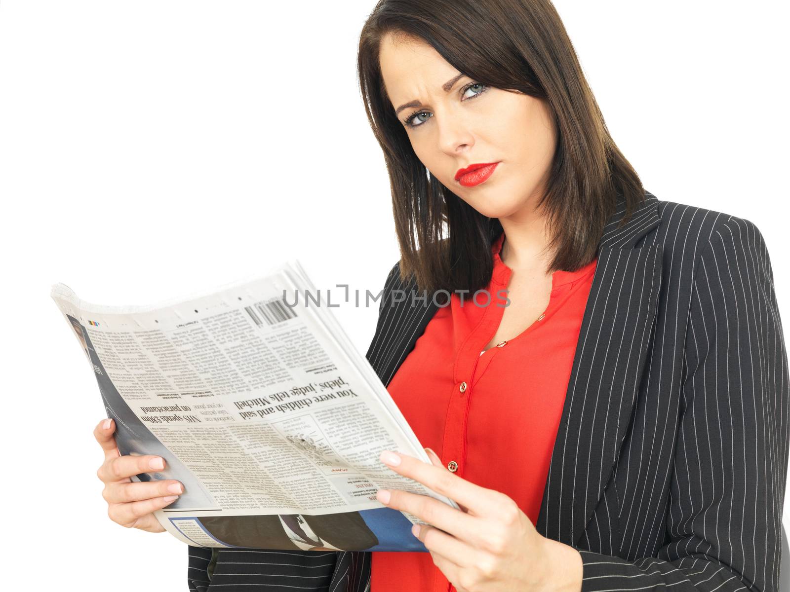 Attractive Business Woman Reading a Newspaper