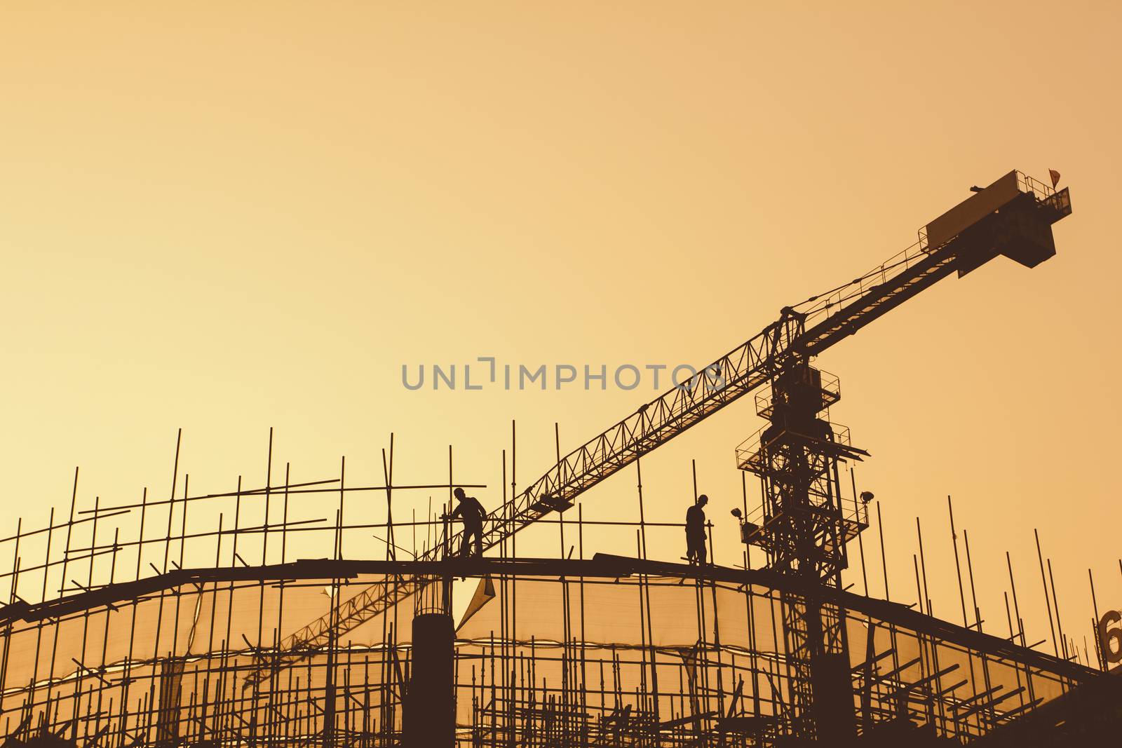 Construction workers and scaffolding 