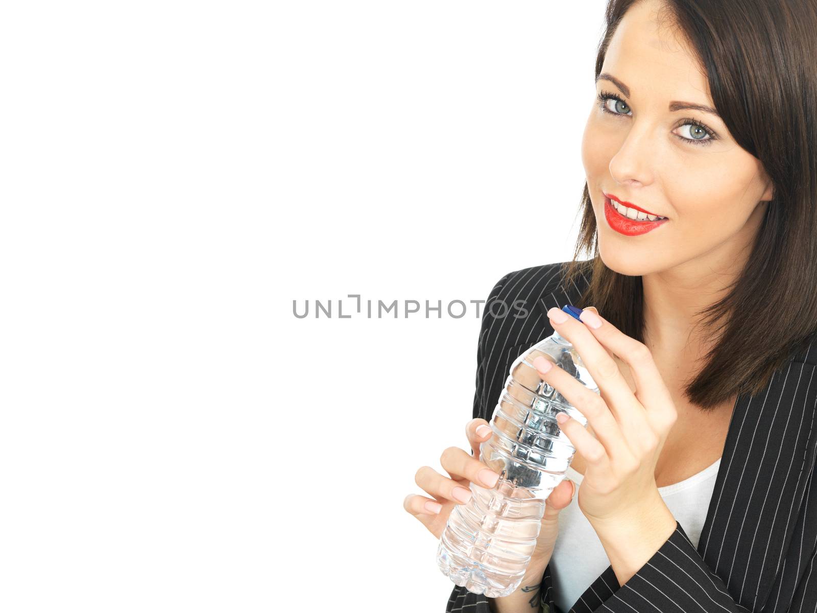 Attractive Business Woman Drinking a Bottle of Water