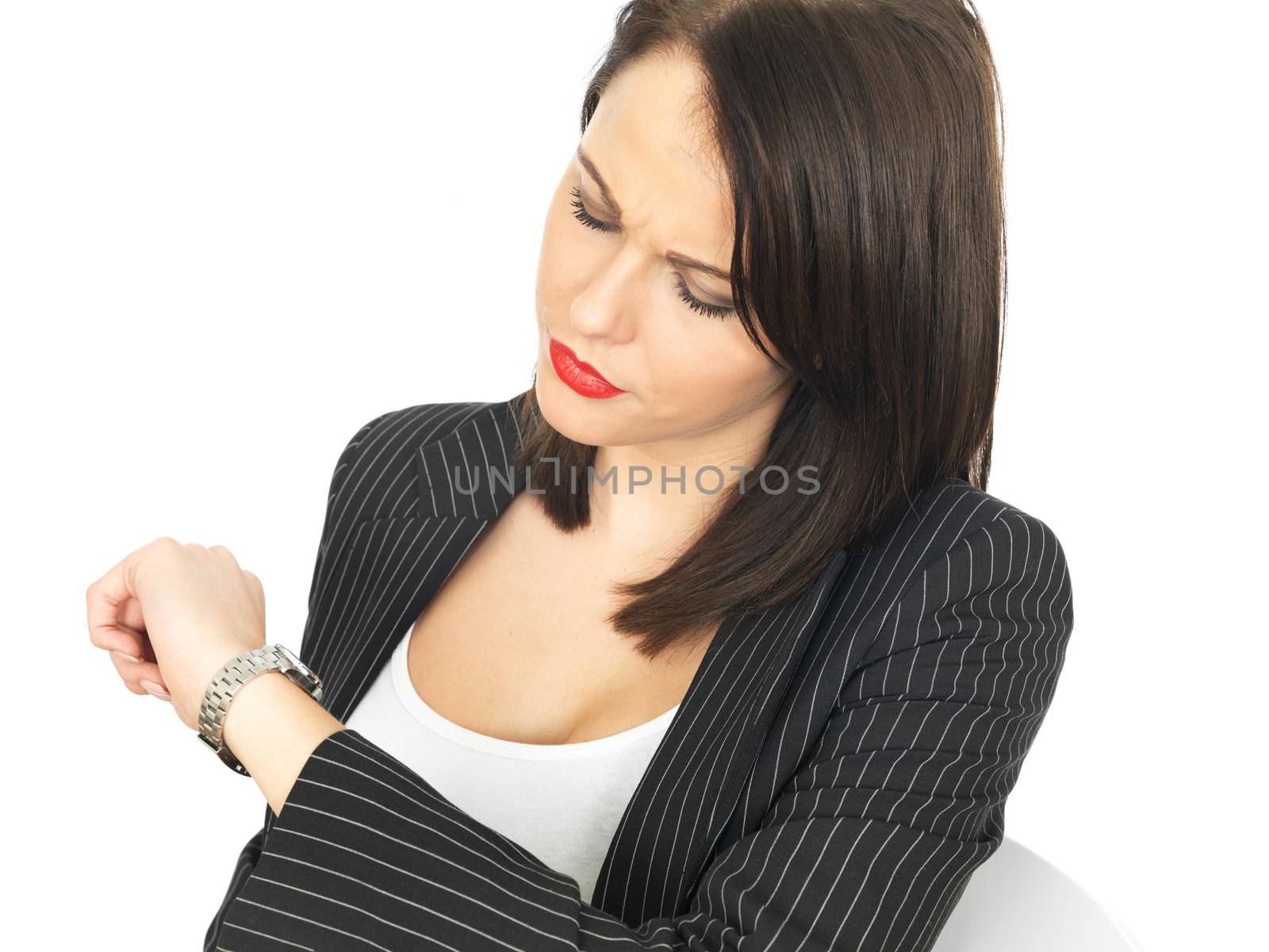 Young Business Woman Checking the Time by Whiteboxmedia