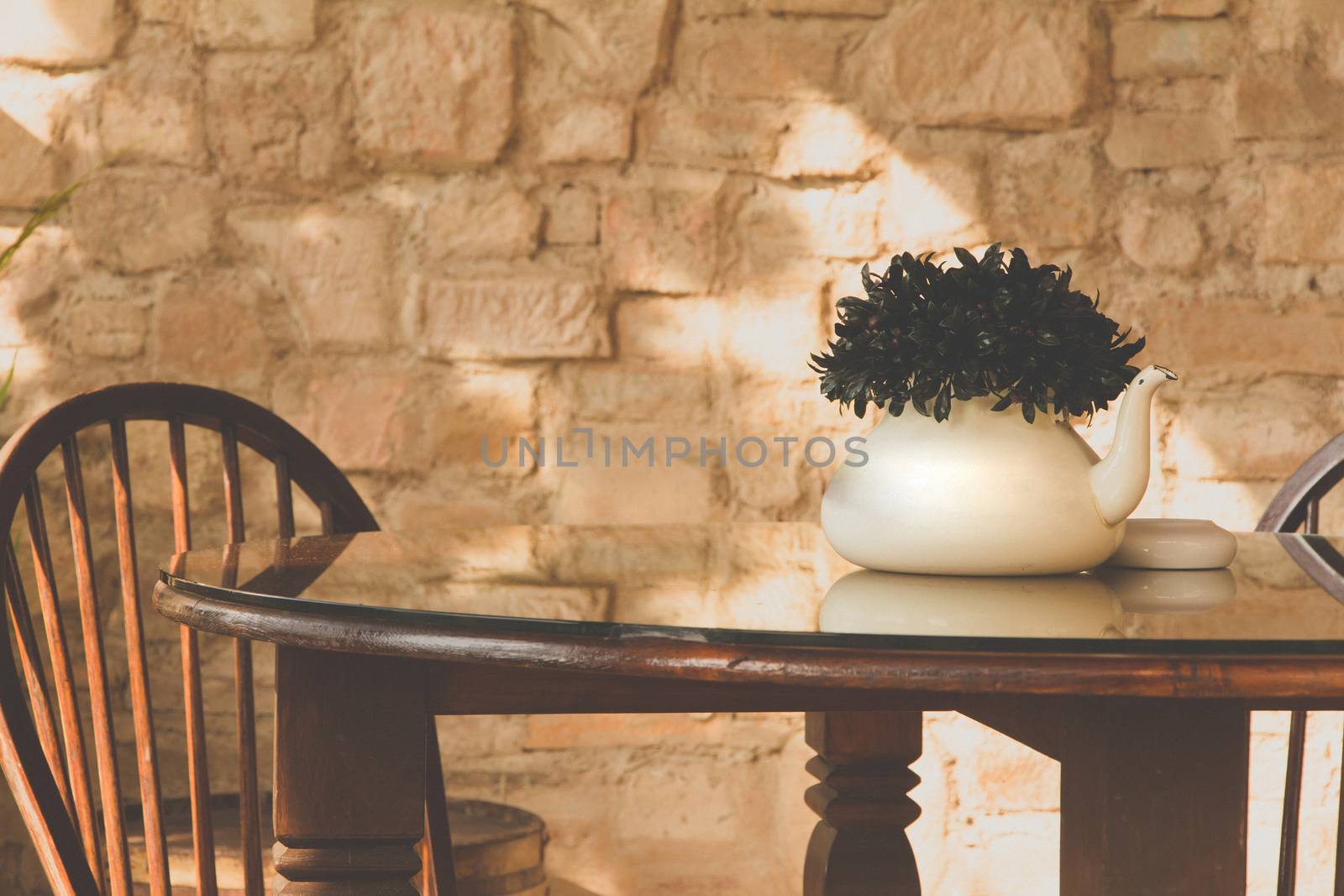 vintage chair and table with flower