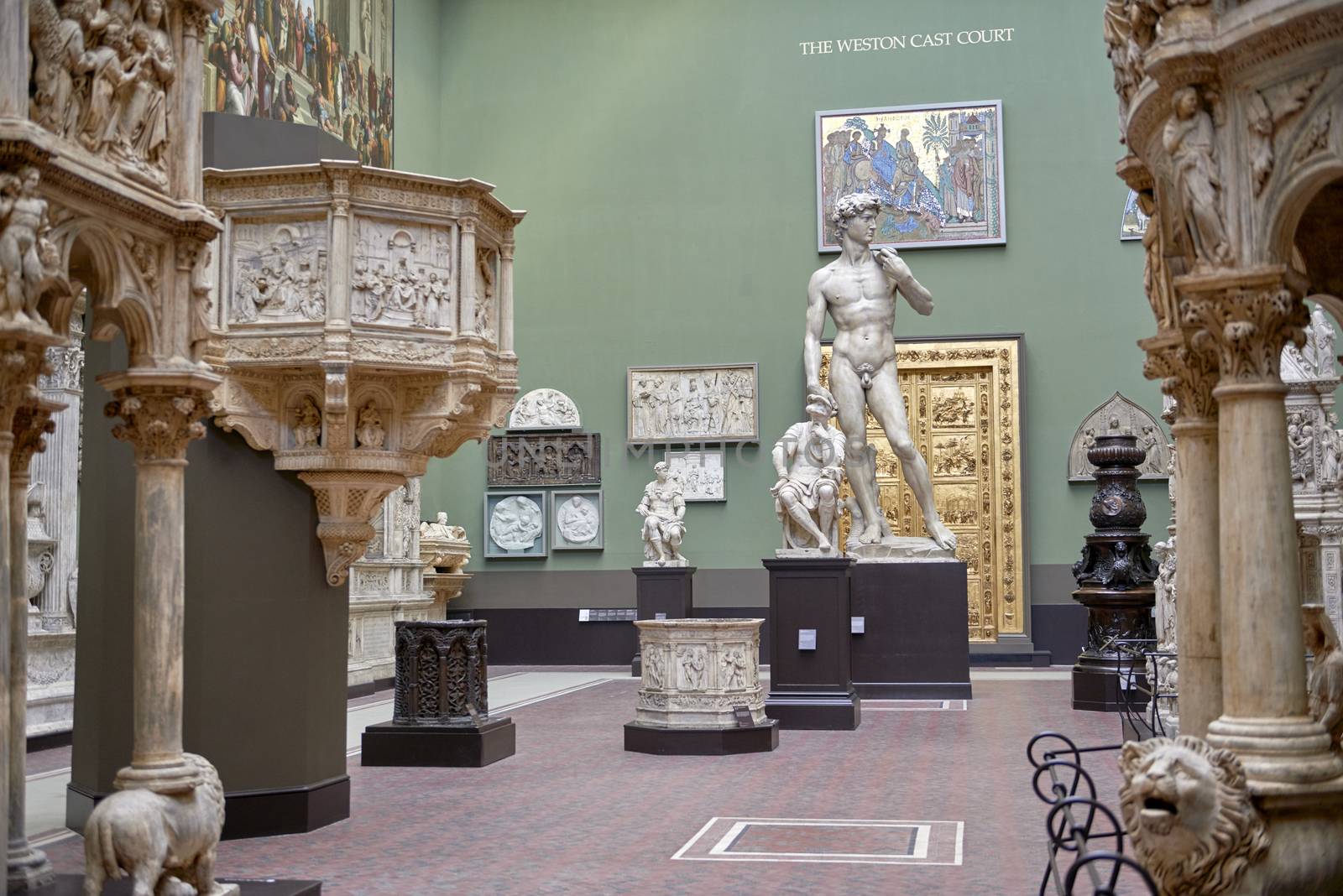 LONDON, UK - DECEMBER 20: The Weston Cast Court at the Victoria and Albert Museum. December 20, 2014 in London. The room includes a 5 meters tall plaster cast of Michelangelo's David.