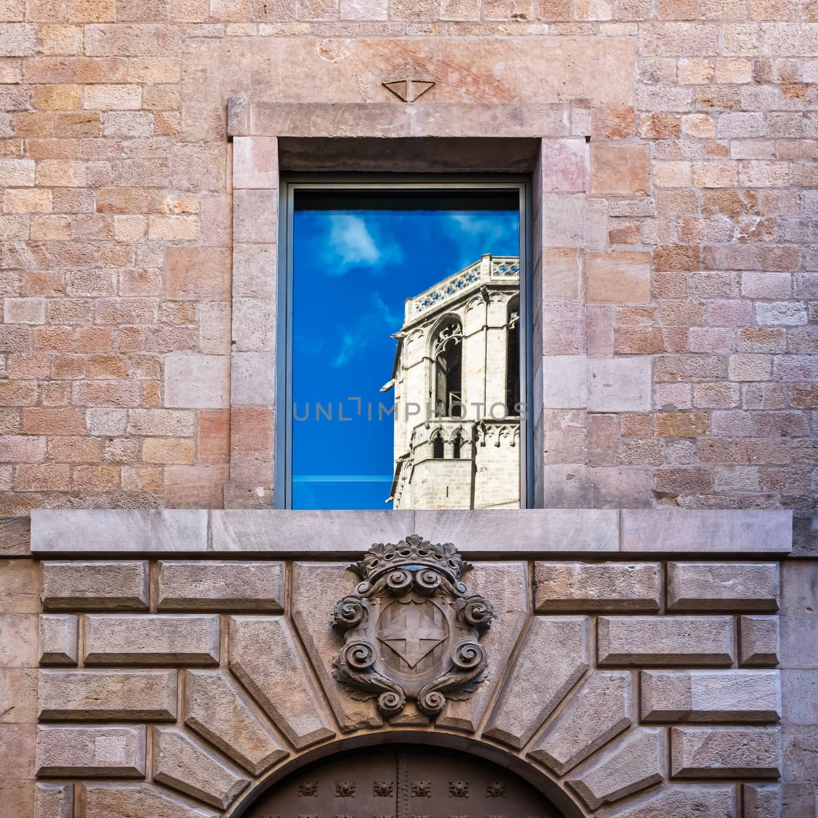 Sky and Cathedral of the Holy Cross Reflection in Reial Major Palace, Barcelona, Catalonia, Spain