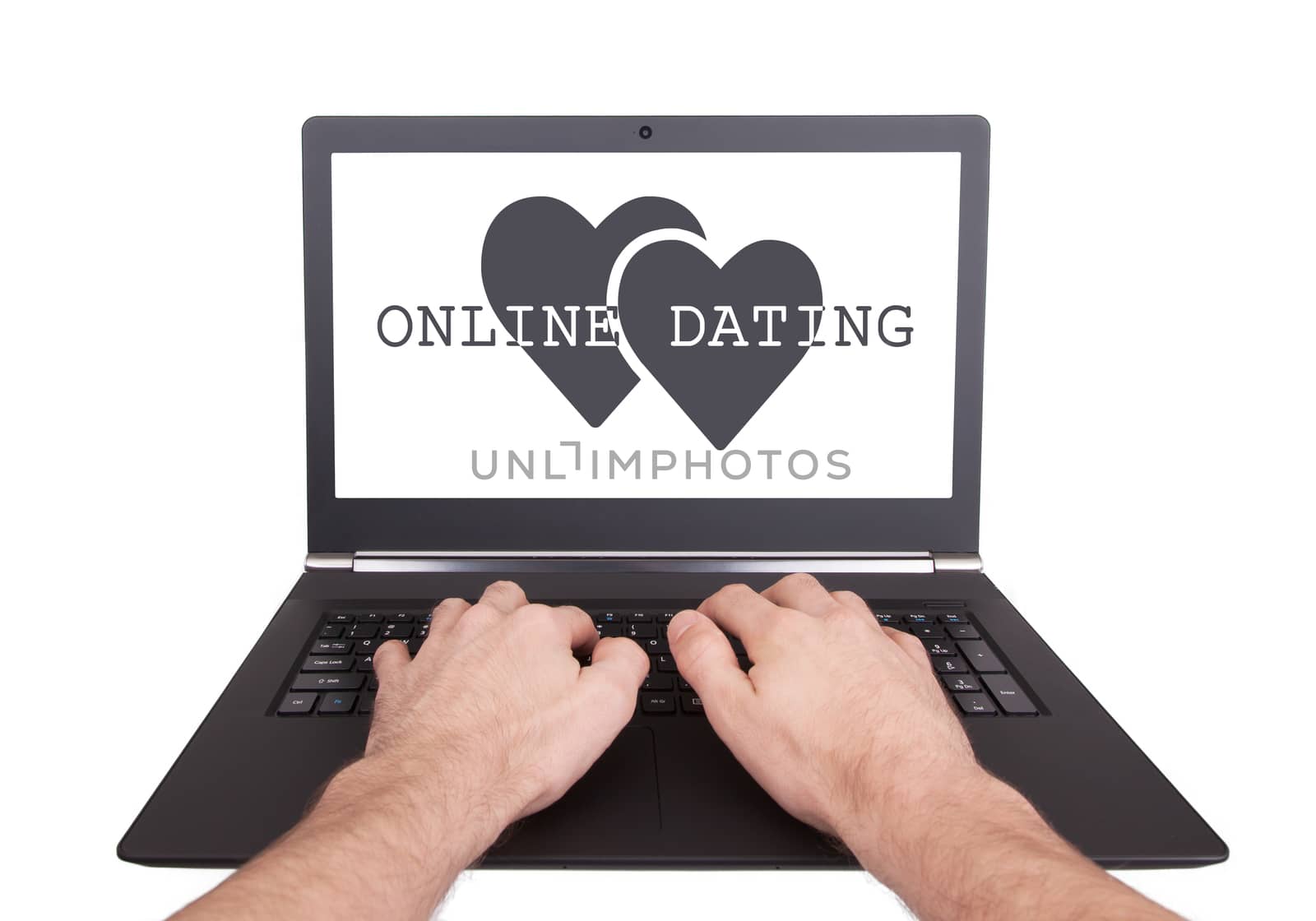 Man working on laptop, online dating by michaklootwijk