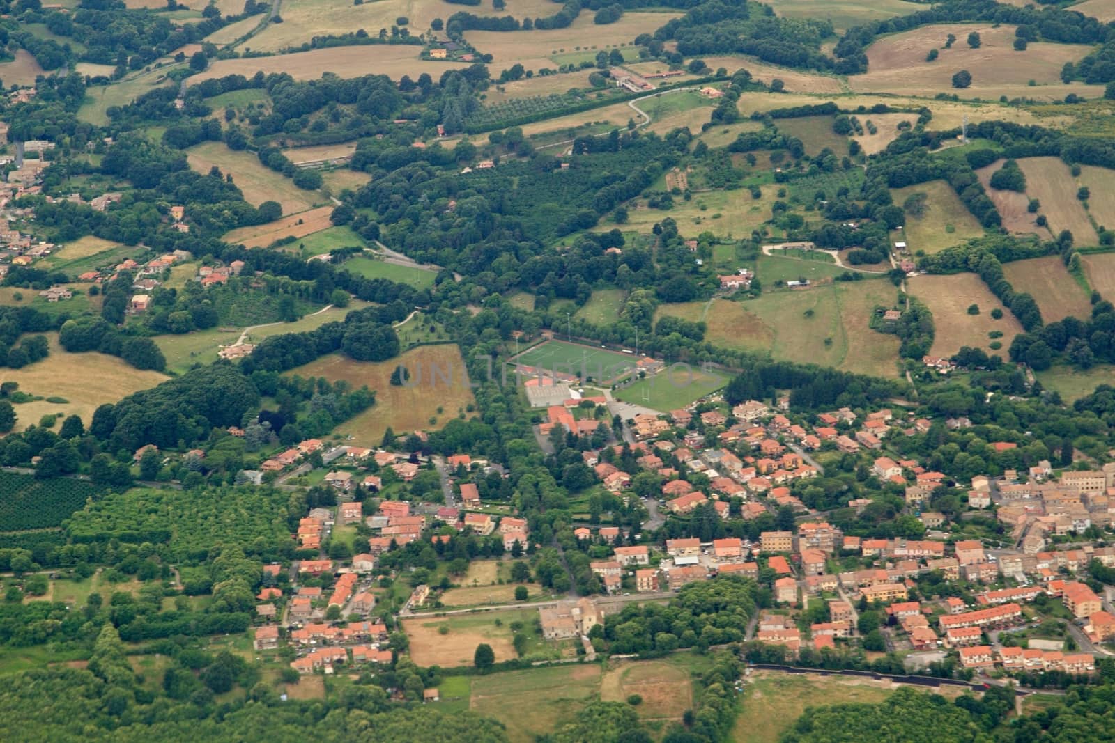 Photo shows Italian landscape taken from the plane.