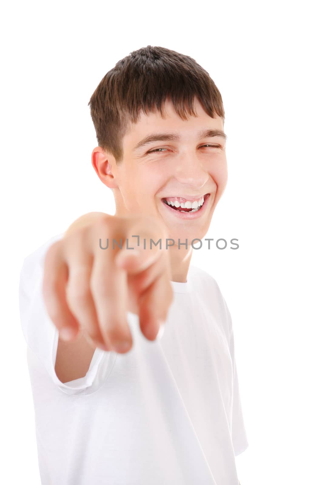 Cheerful Teenager Pointing at You on the White Background