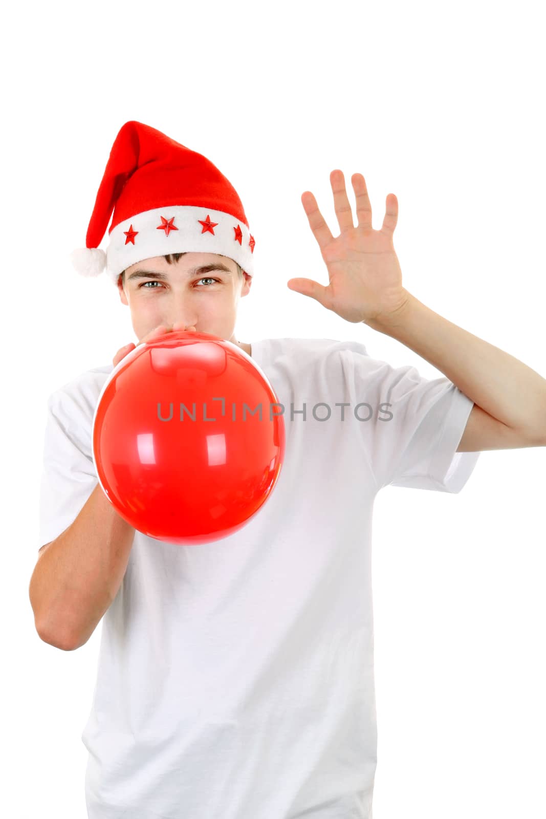 Happy Teenager in Santa's Hat with Red Balloon On The White Background