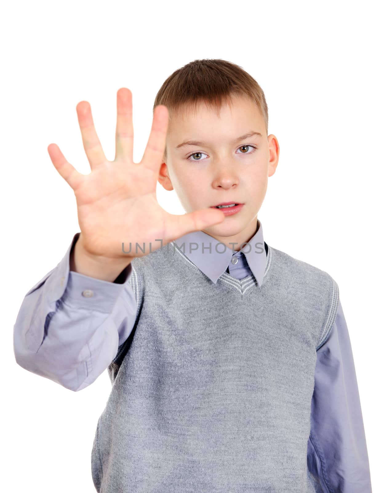 Serious Kid show Stop hand gesture Isolated on the White Background