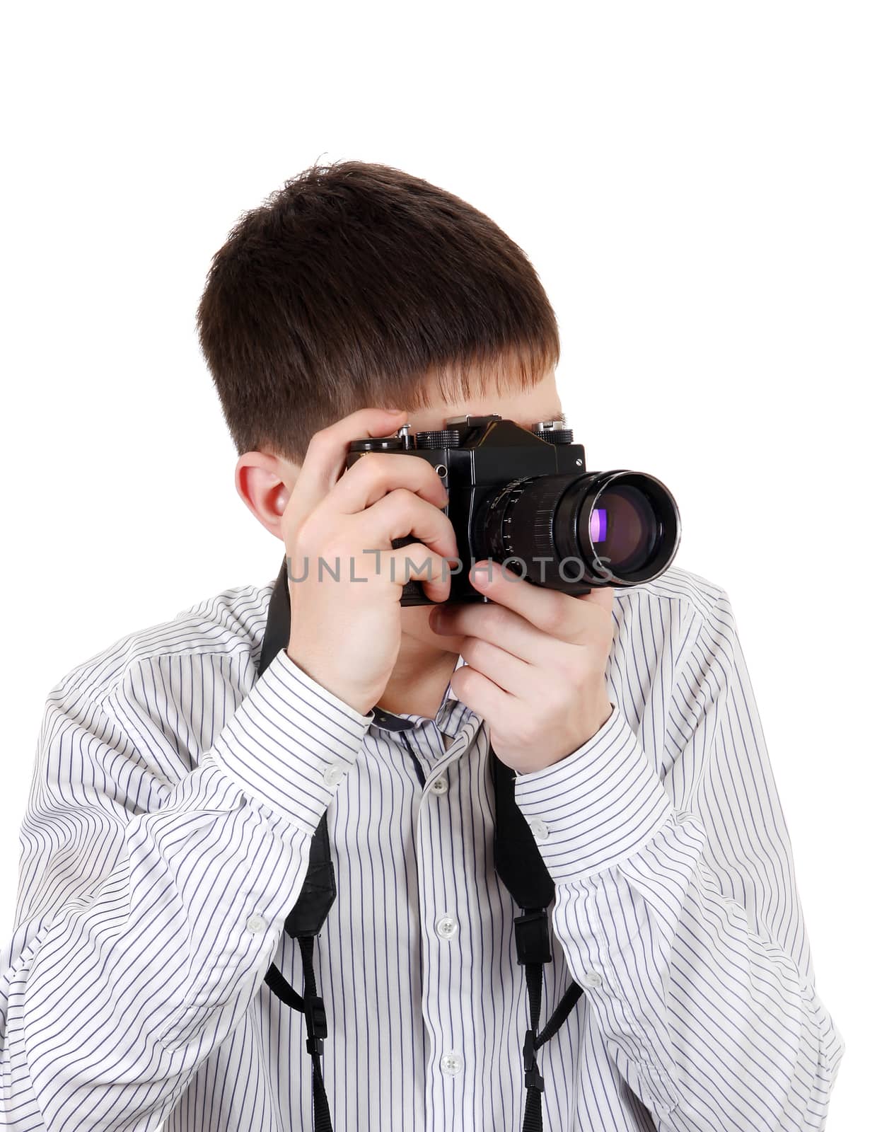 Teenager with a Vintage Photo Camera Isolated on the White