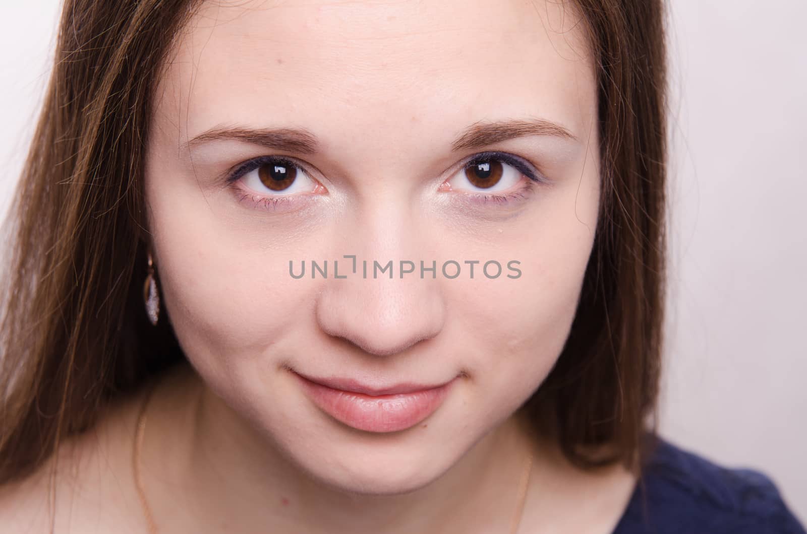 Portrait of beautiful girl with bright makeup, makeup process