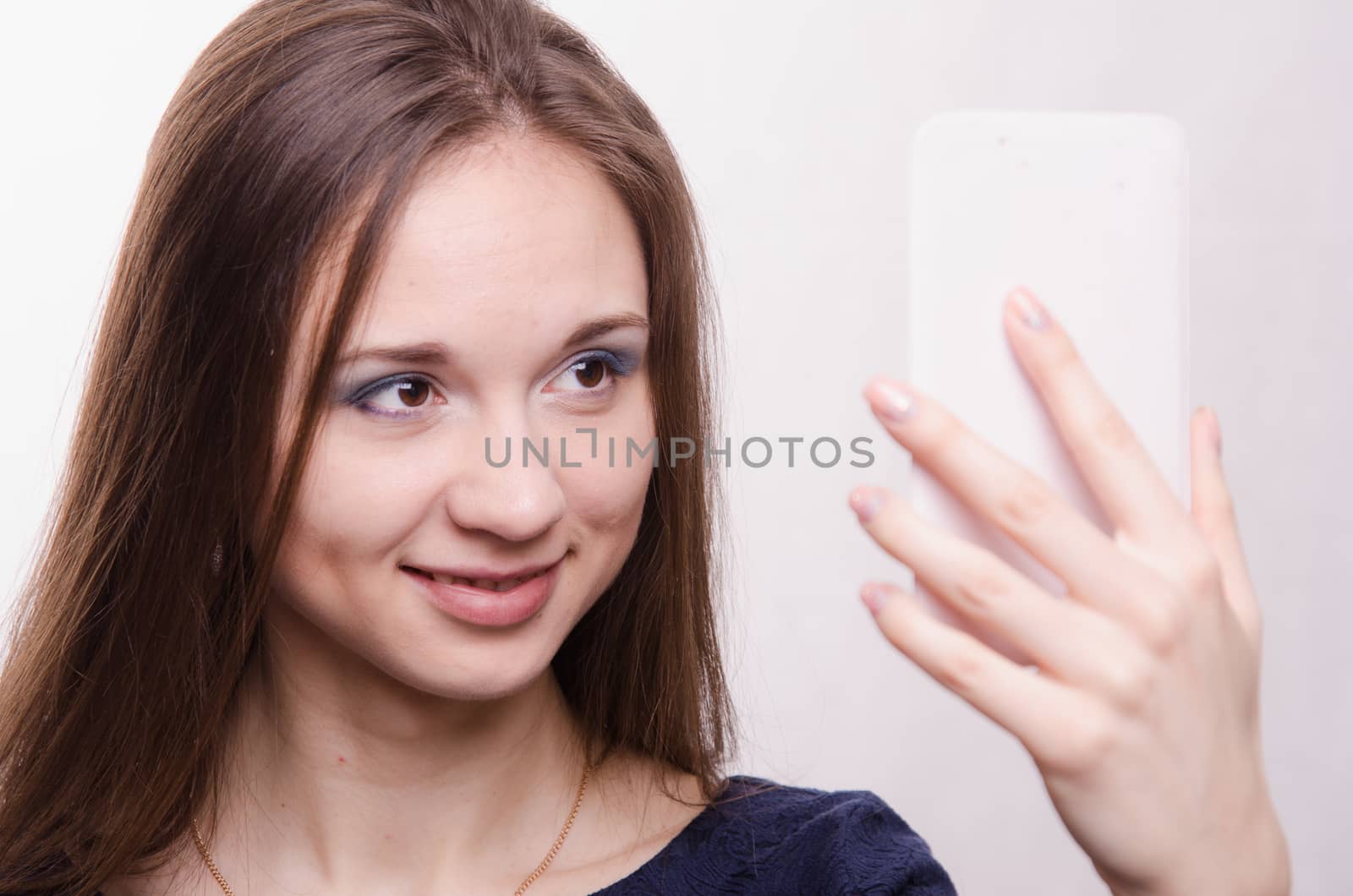 Portrait of beautiful girl with bright makeup, makeup process