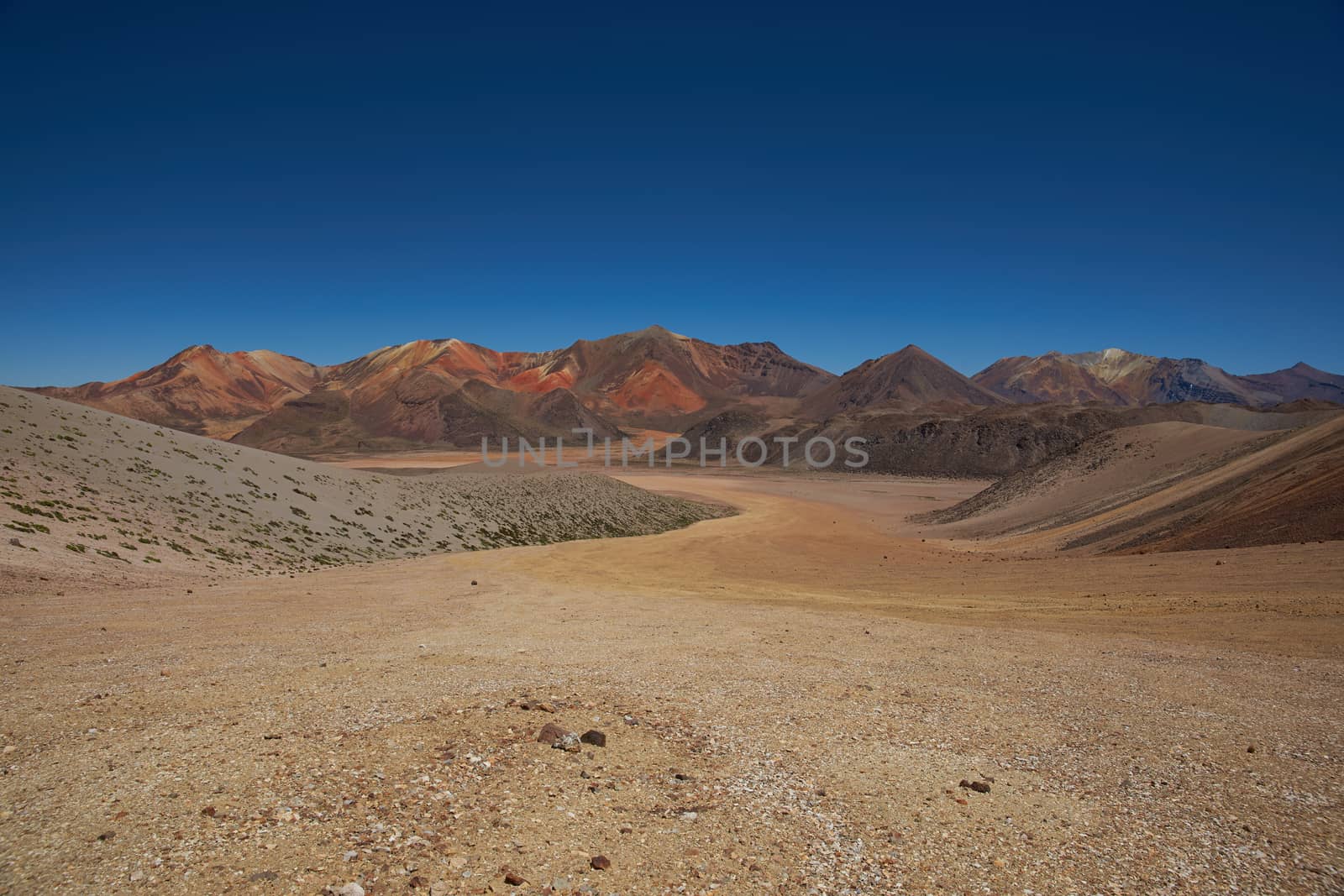 Colourful mountain landscape at Suriplaza in the Atacama Desert of north east Chile. The altitude is in excess of 4,000 metres.
