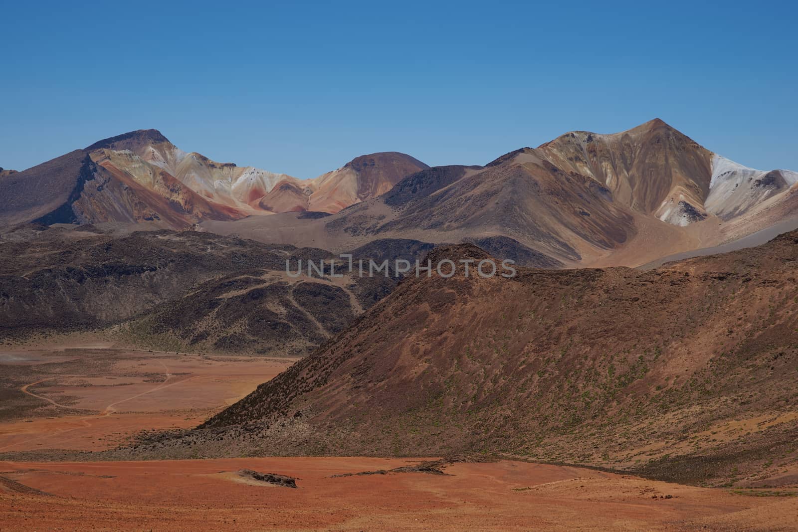 Colourful mountain landscape at Suriplaza in the Atacama Desert of north east Chile. The altitude is in excess of 4,000 metres.