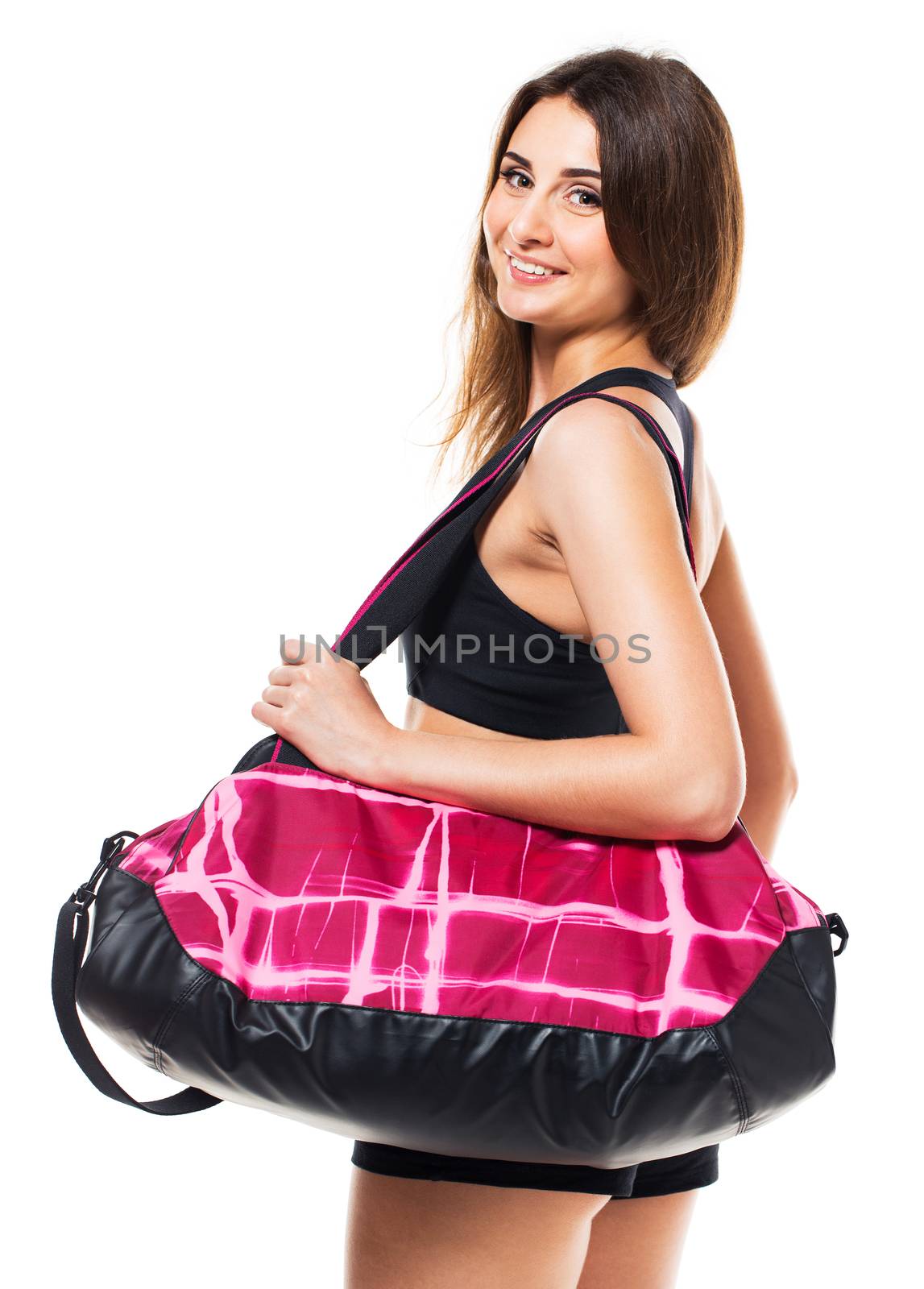 Portrait of attractive caucasian smiling woman with sports bag isolated on white background