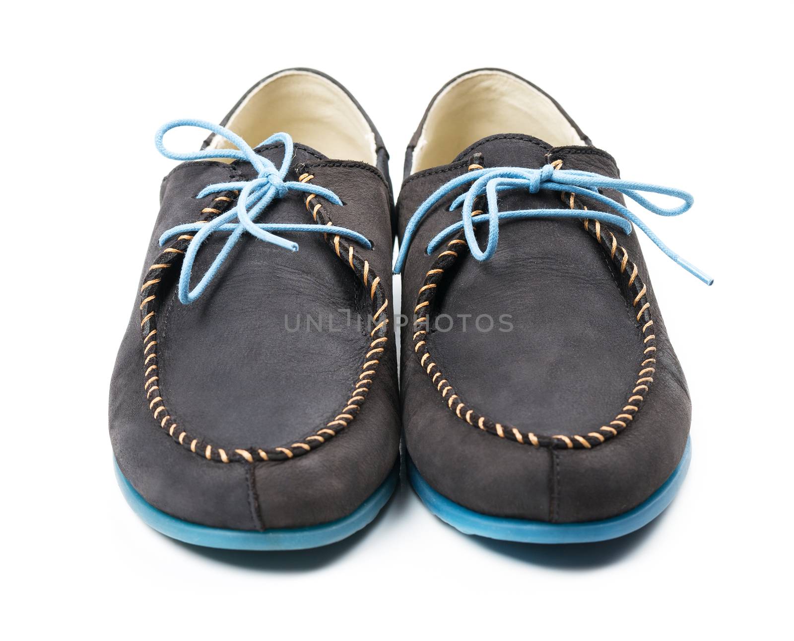 Black men's leather loafers with blue soles and laces on a white background