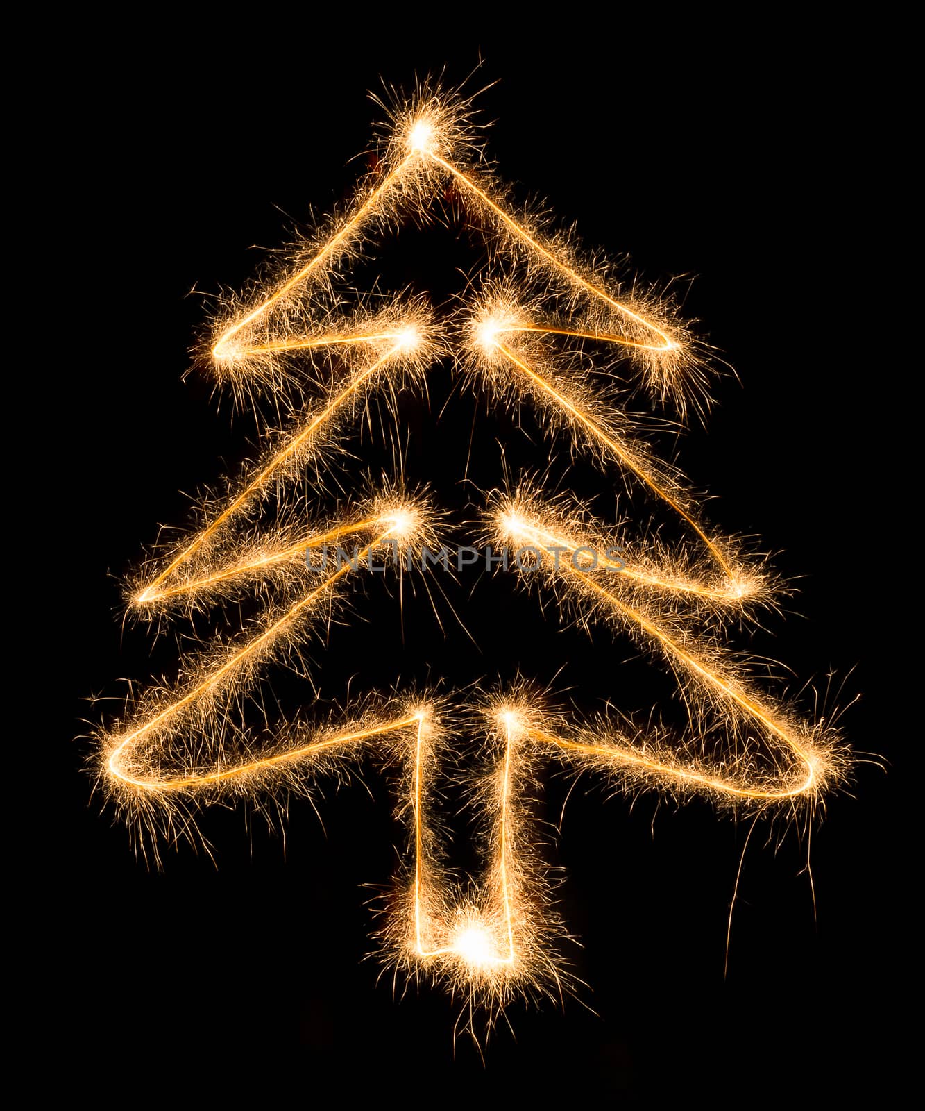 Christmas tree made by sparkler on a black background