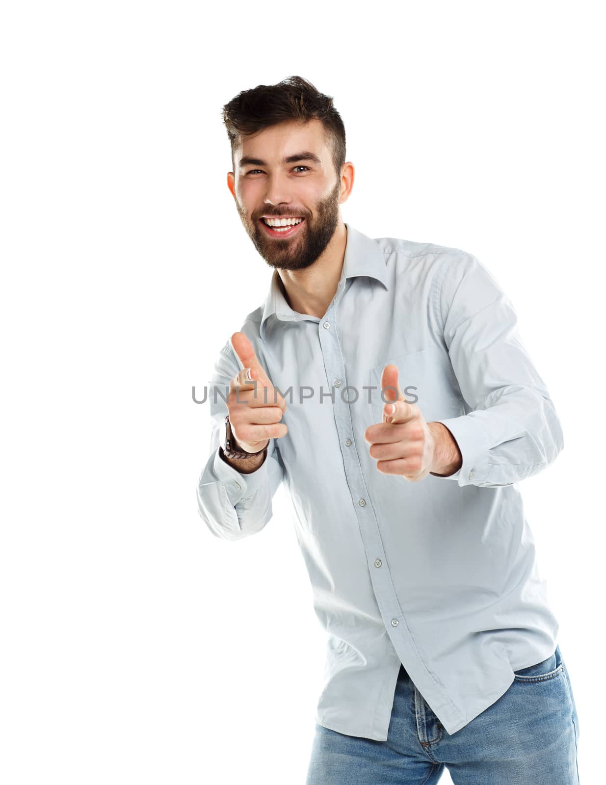 A young bearded man smiling with a fingers up isolated on white by vlad_star