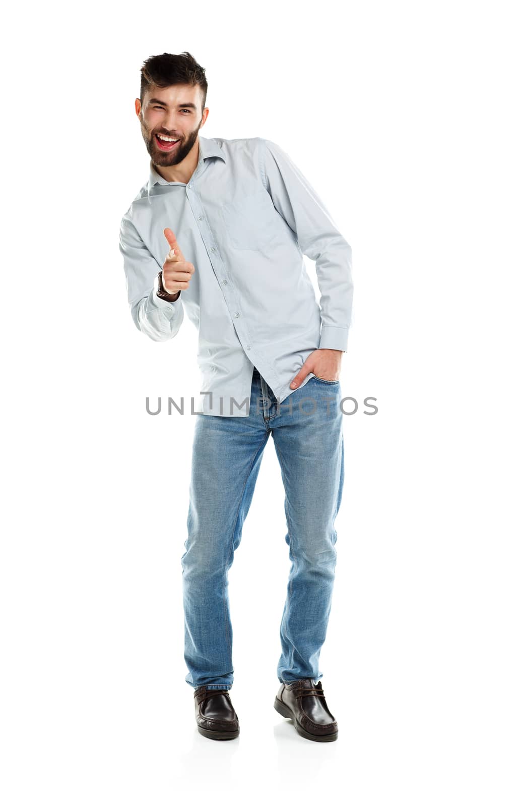 A young bearded man smiling with a finger up isolated on white by vlad_star