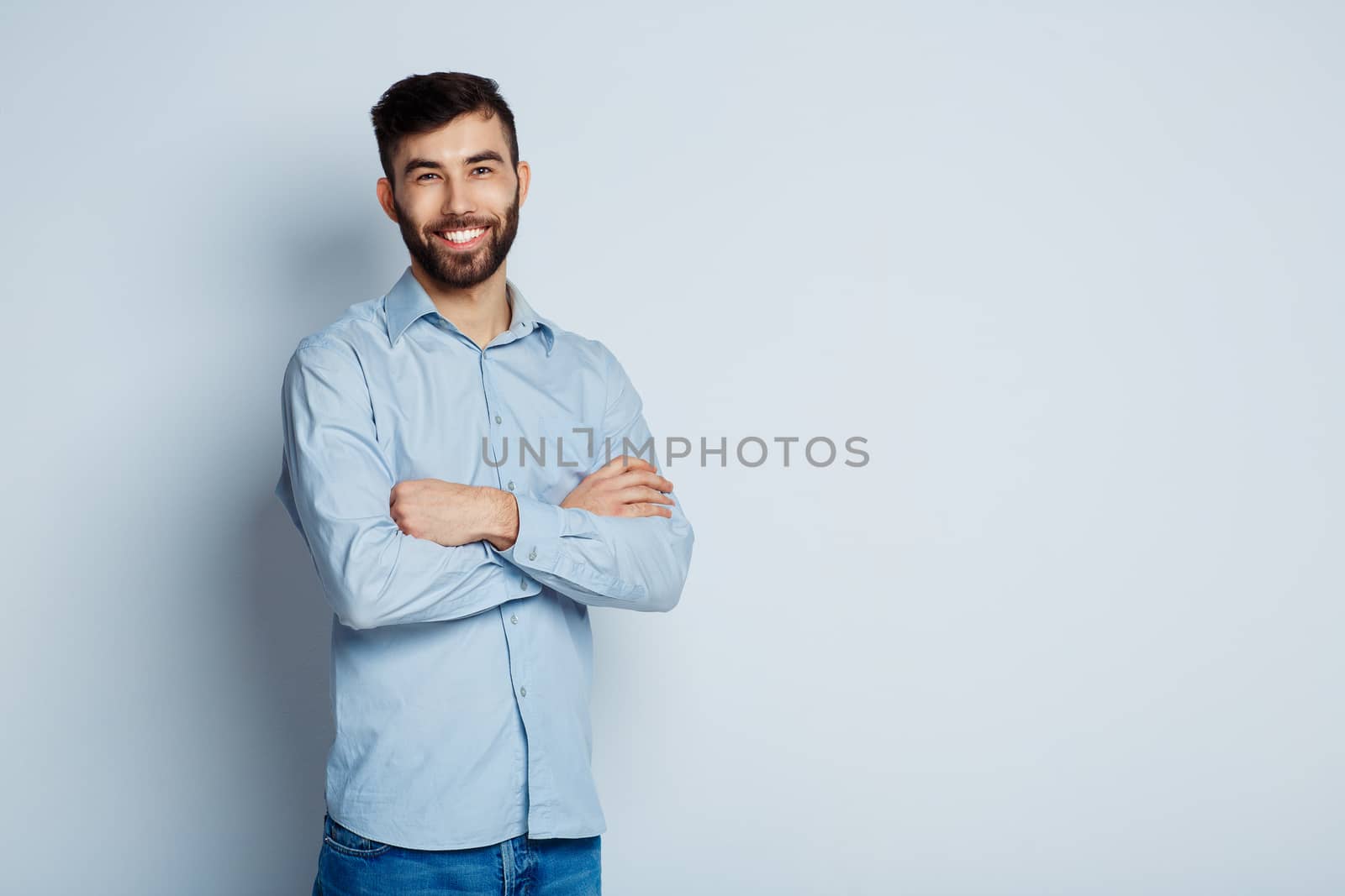 A young bearded man smiling by vlad_star