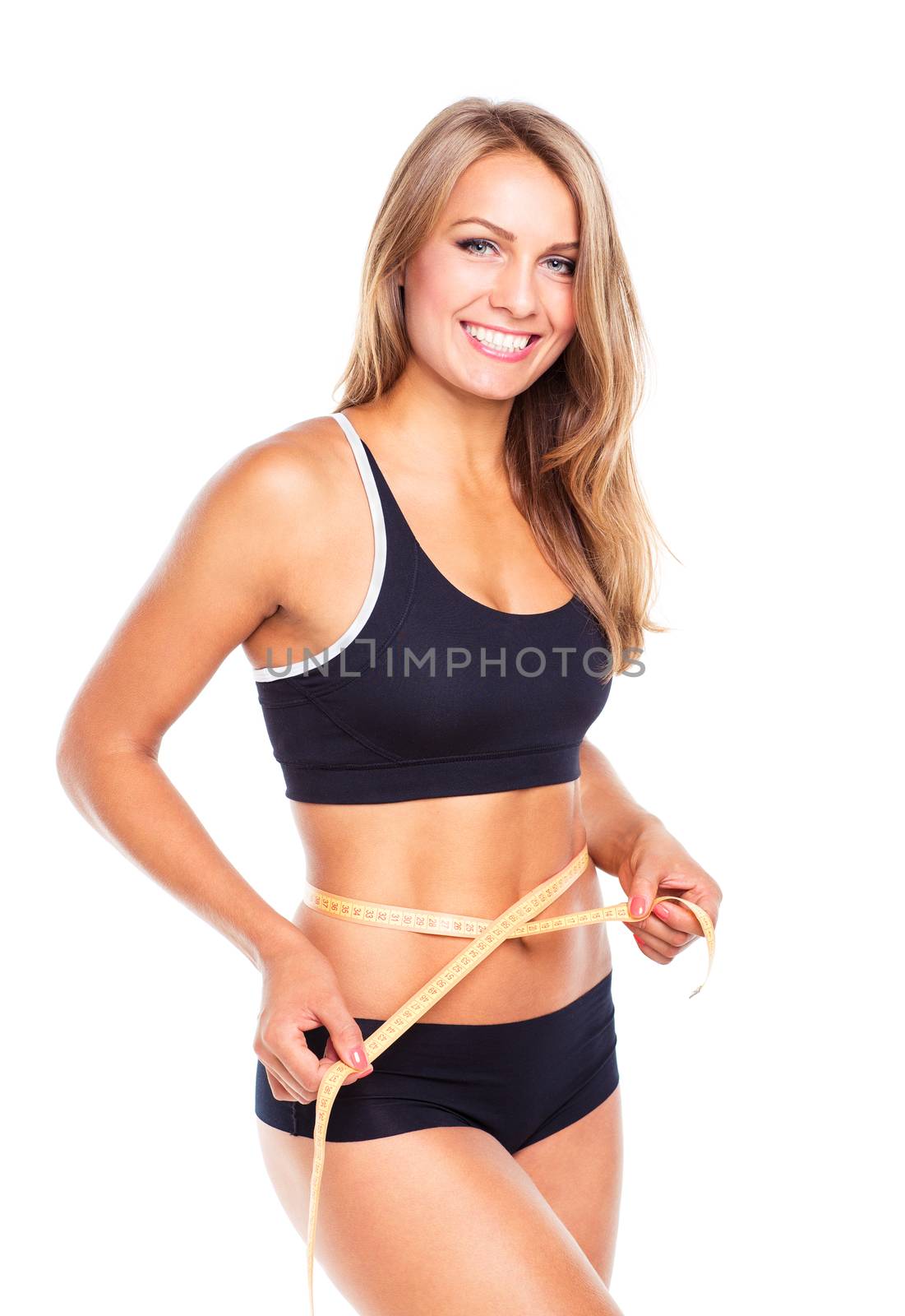 Woman measuring perfect shape of beautiful thigh, healthy lifestyles concept on white