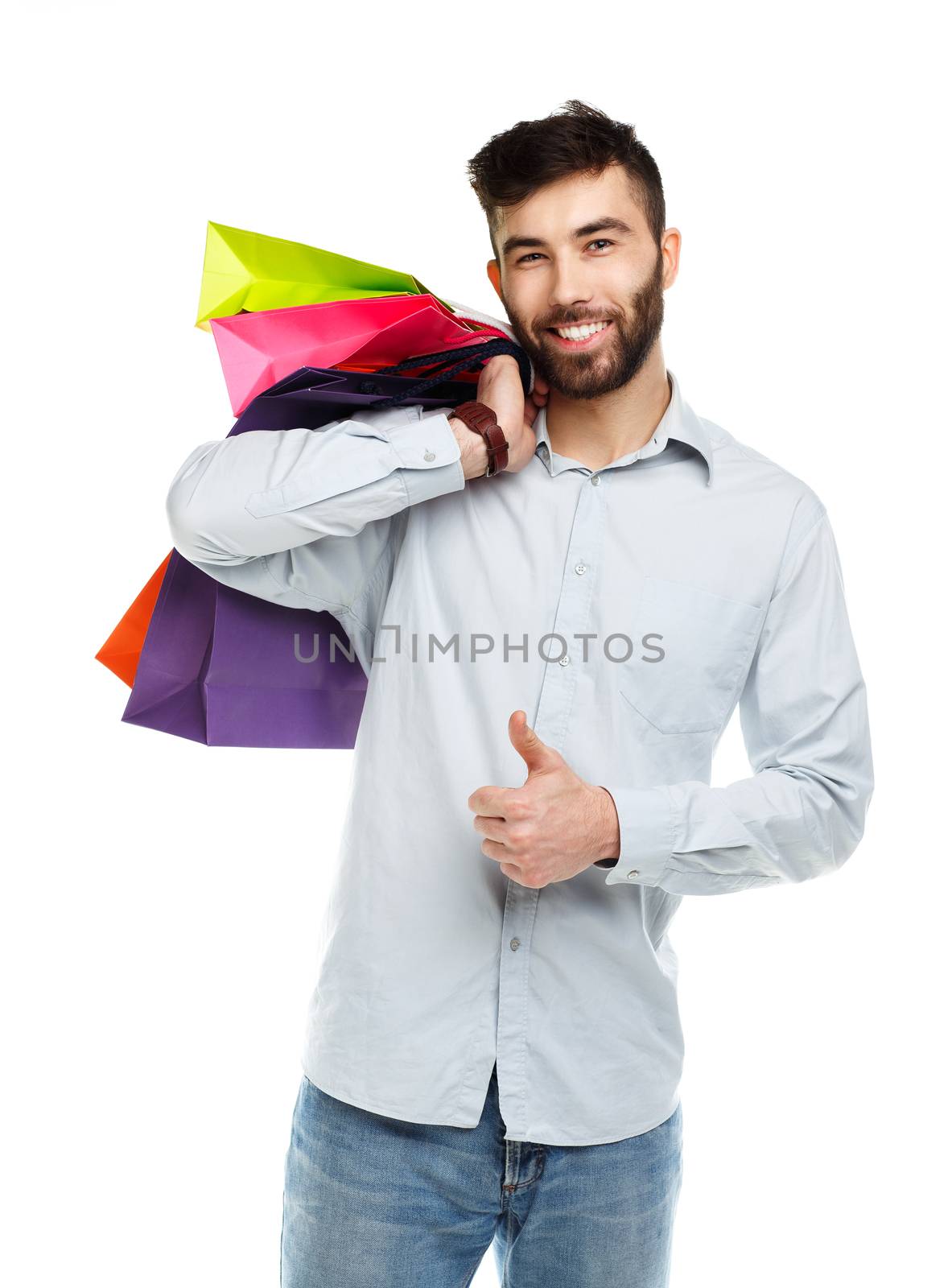 Handsome man holding shopping bags by vlad_star