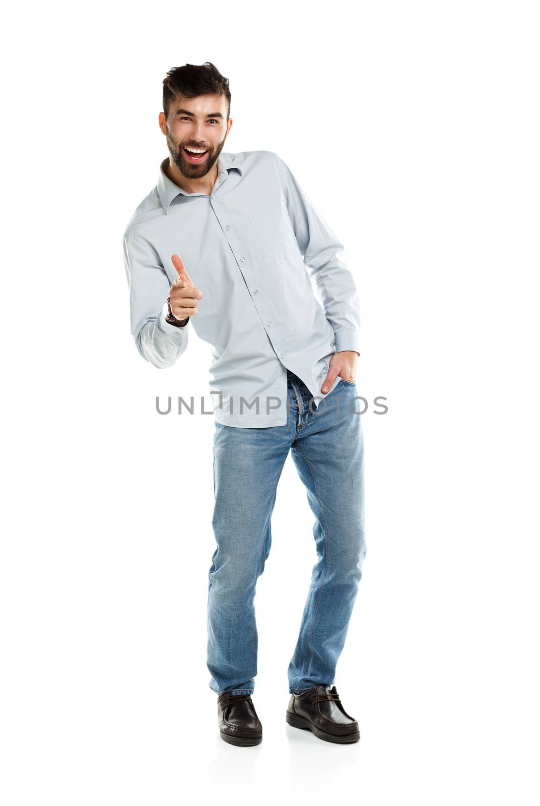 A young bearded man smiling with a finger up isolated on white by vlad_star