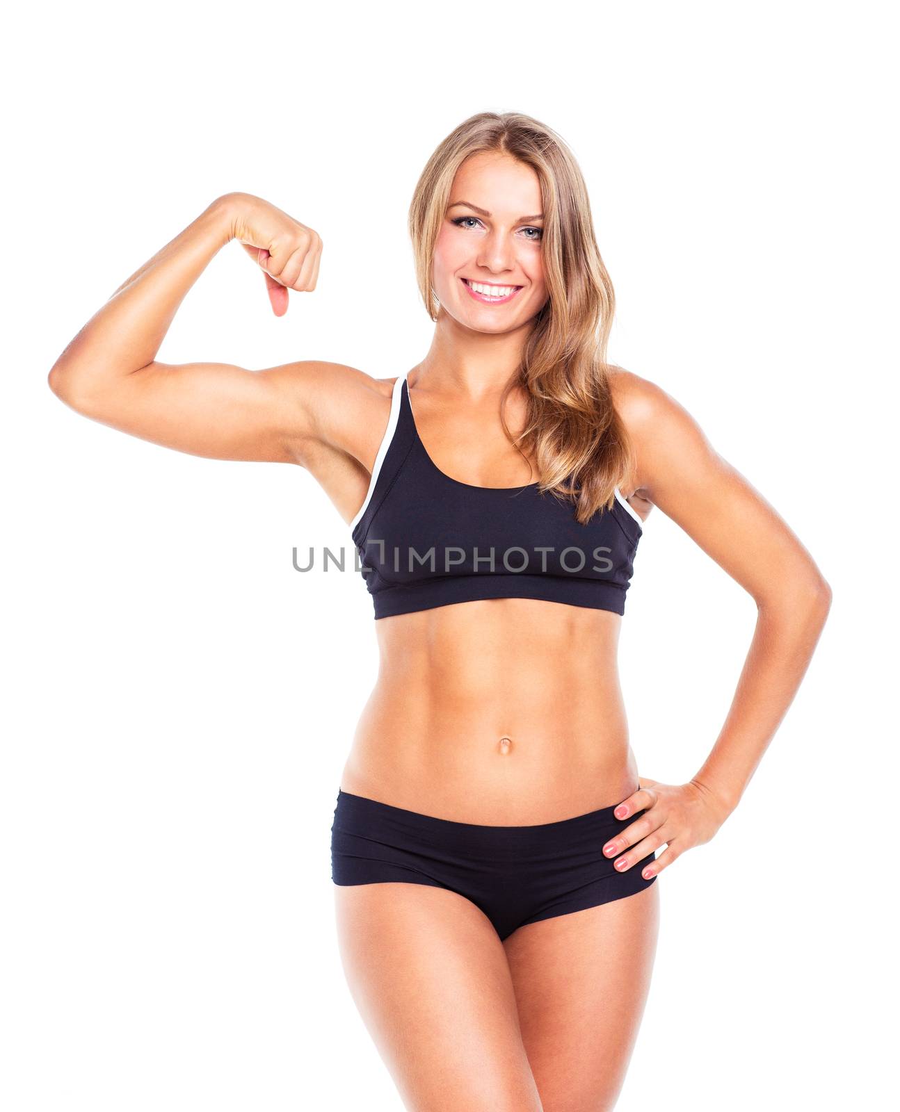 Young athletic girl on white background