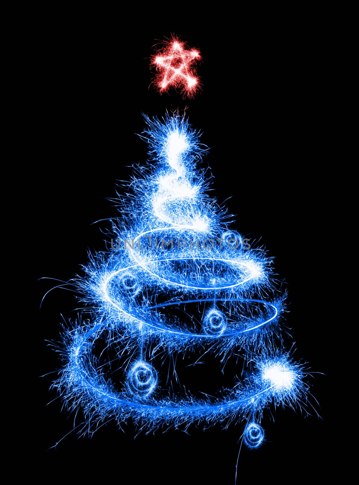 Christmas tree made by sparkler on a black background