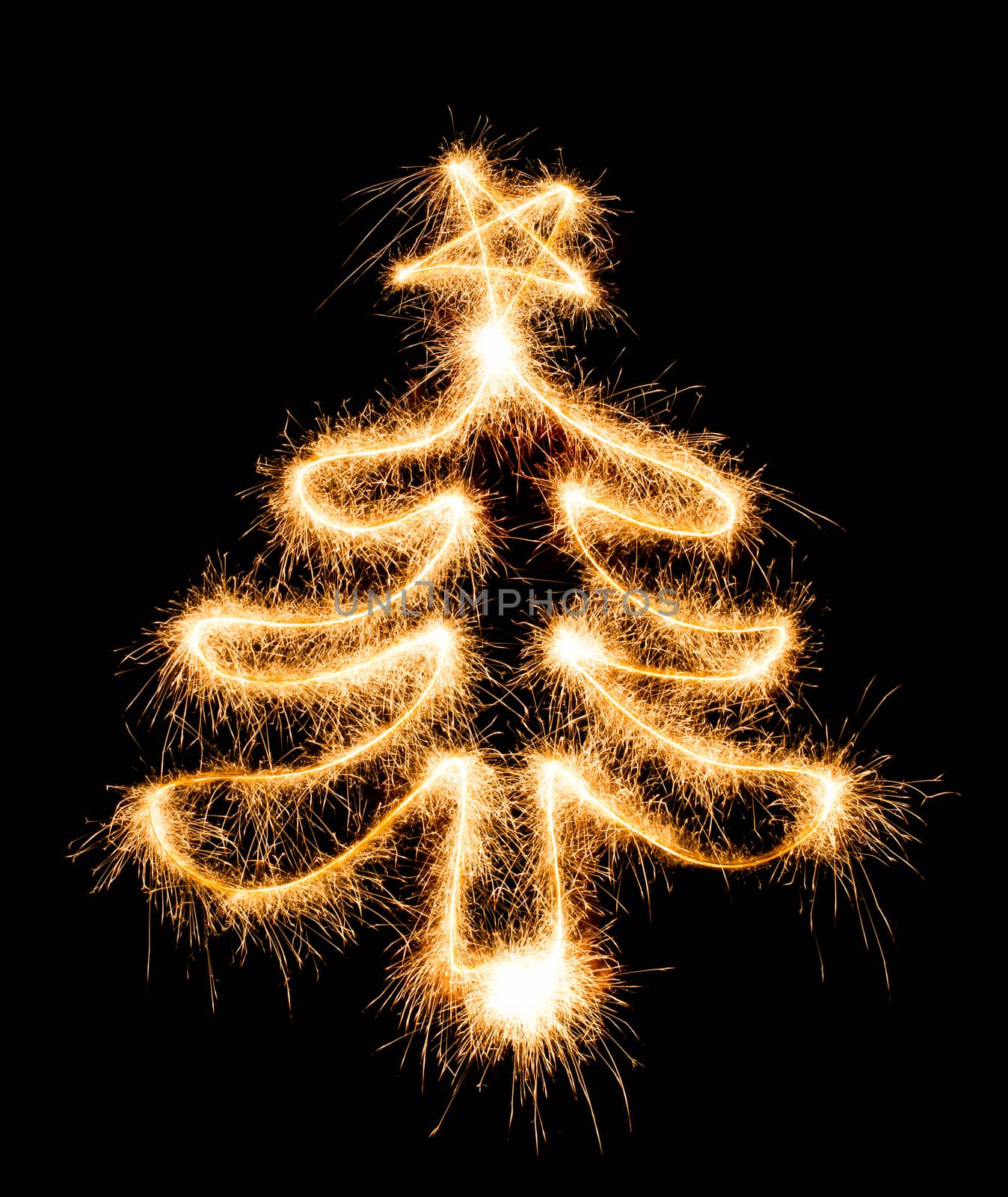 Christmas tree made by sparkler on a black background