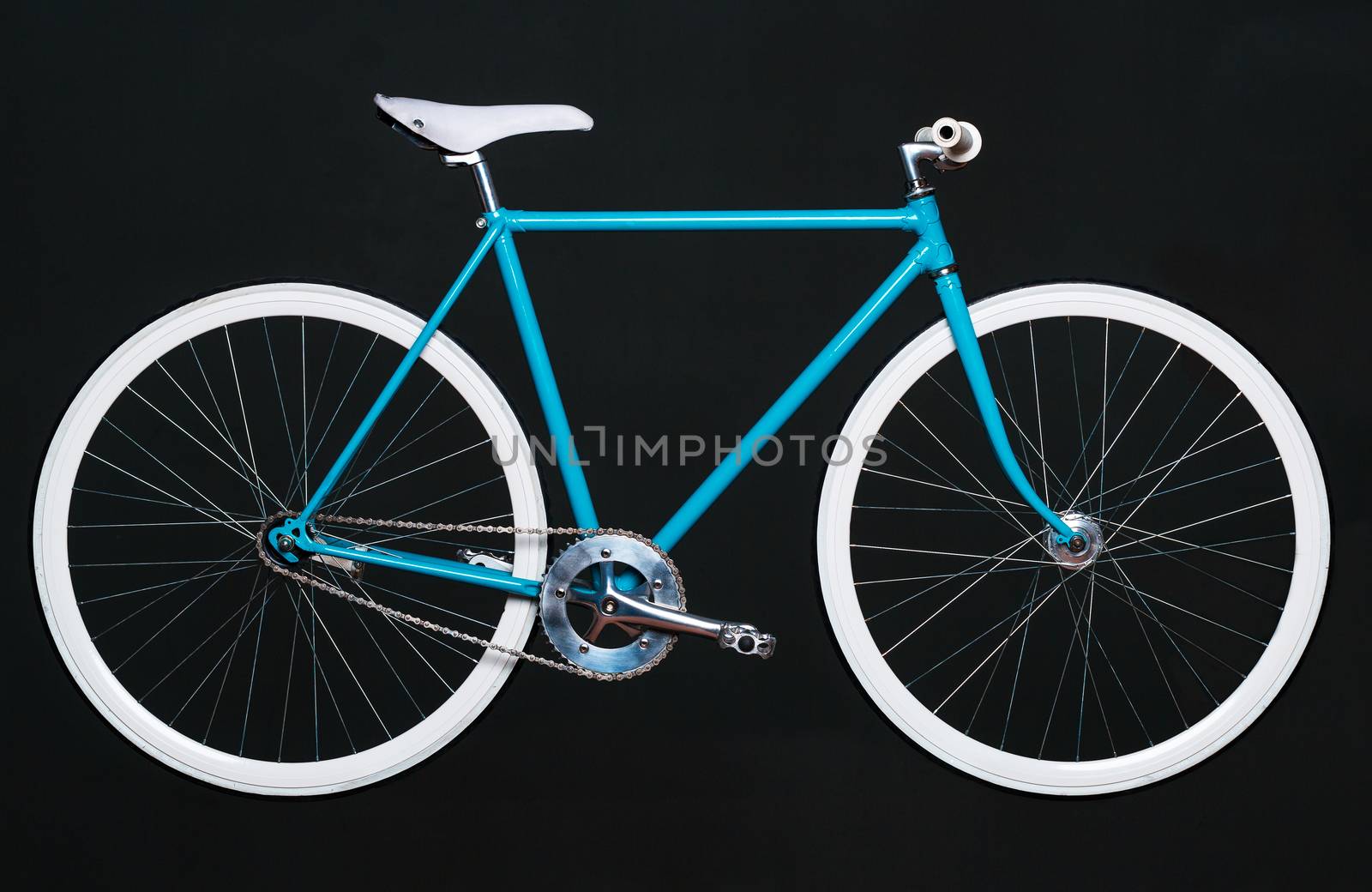 Stylish womens blue bicycle isolated on black by vlad_star