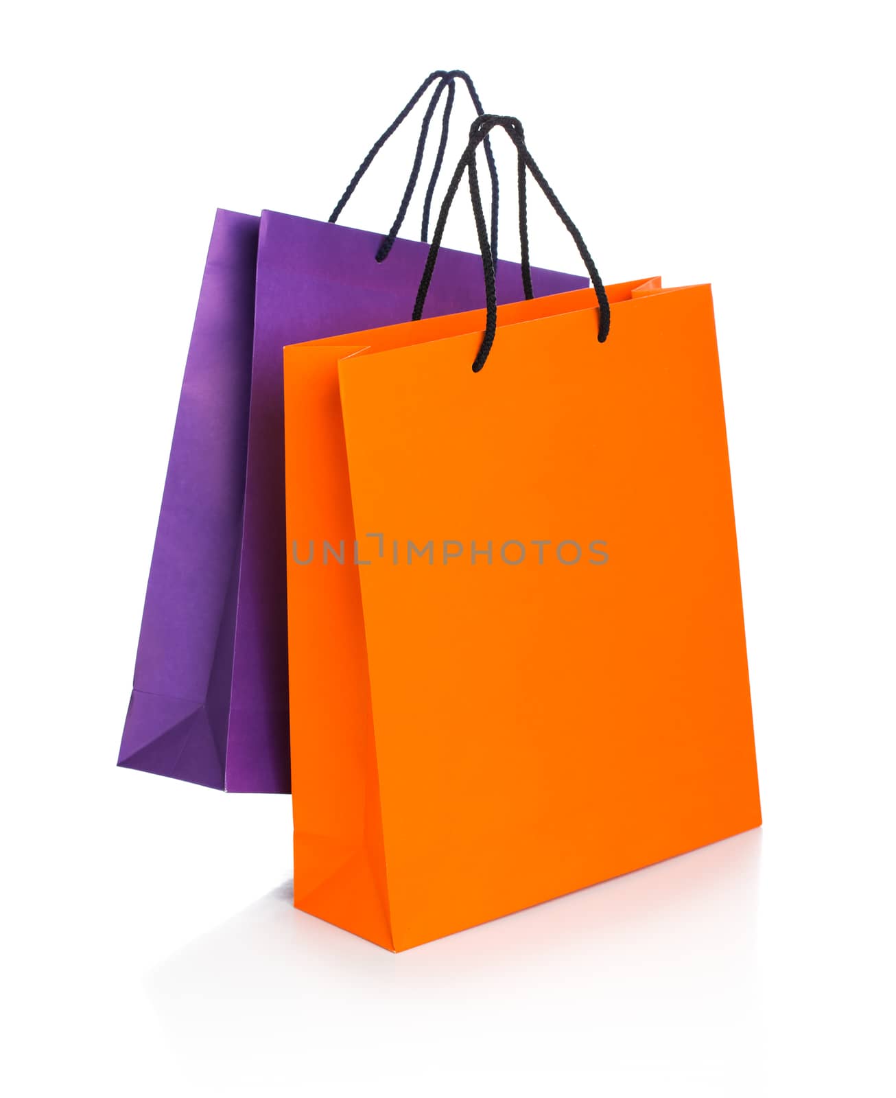 Two paper Shopping bags with reflection on white background