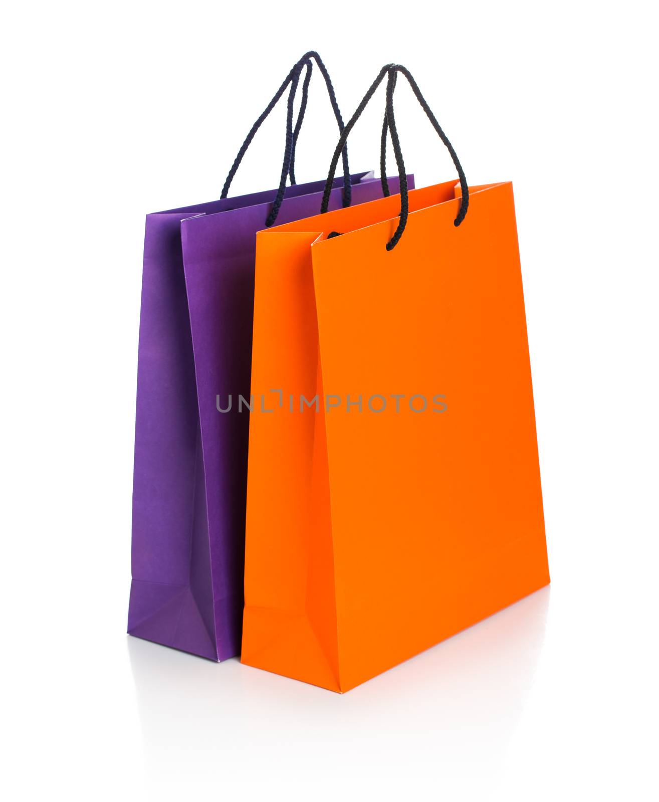 Two paper Shopping bags with reflection on white background