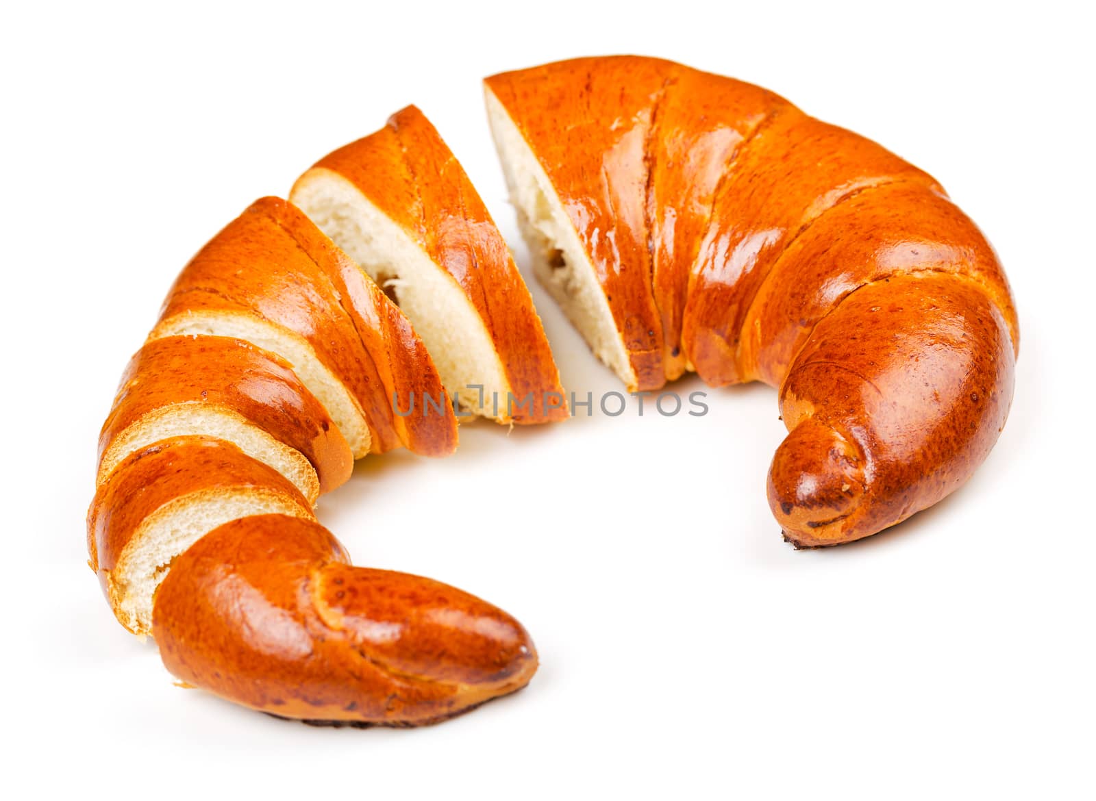 Fresh and tasty bagel with jam sliced pieces over white background