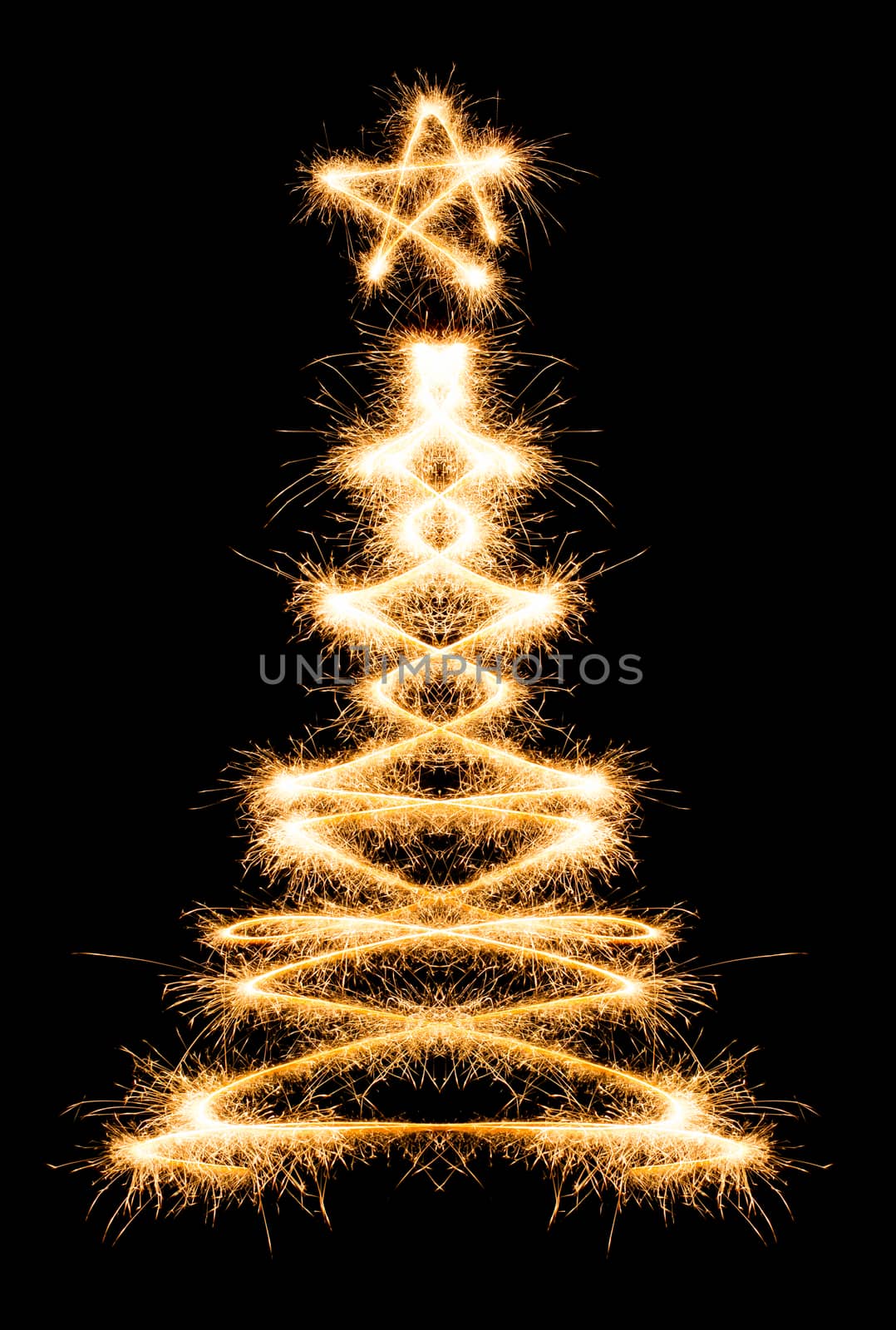 Christmas tree made by sparkler on a black background