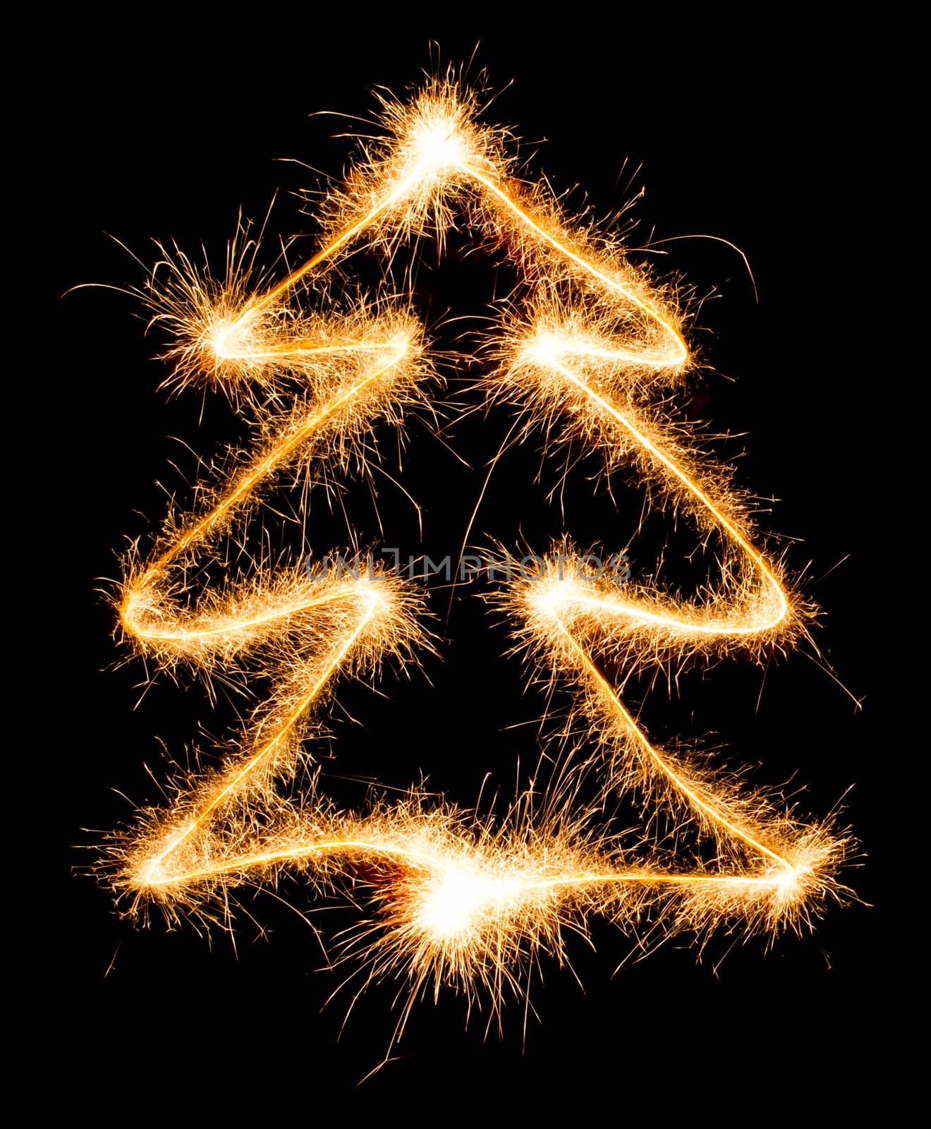 Christmas tree made by sparkler on a black background