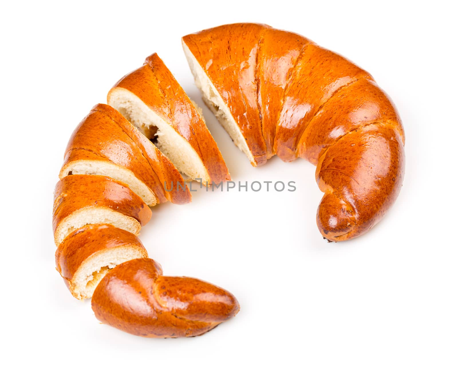 Fresh and tasty bagel with jam sliced ??pieces over white background