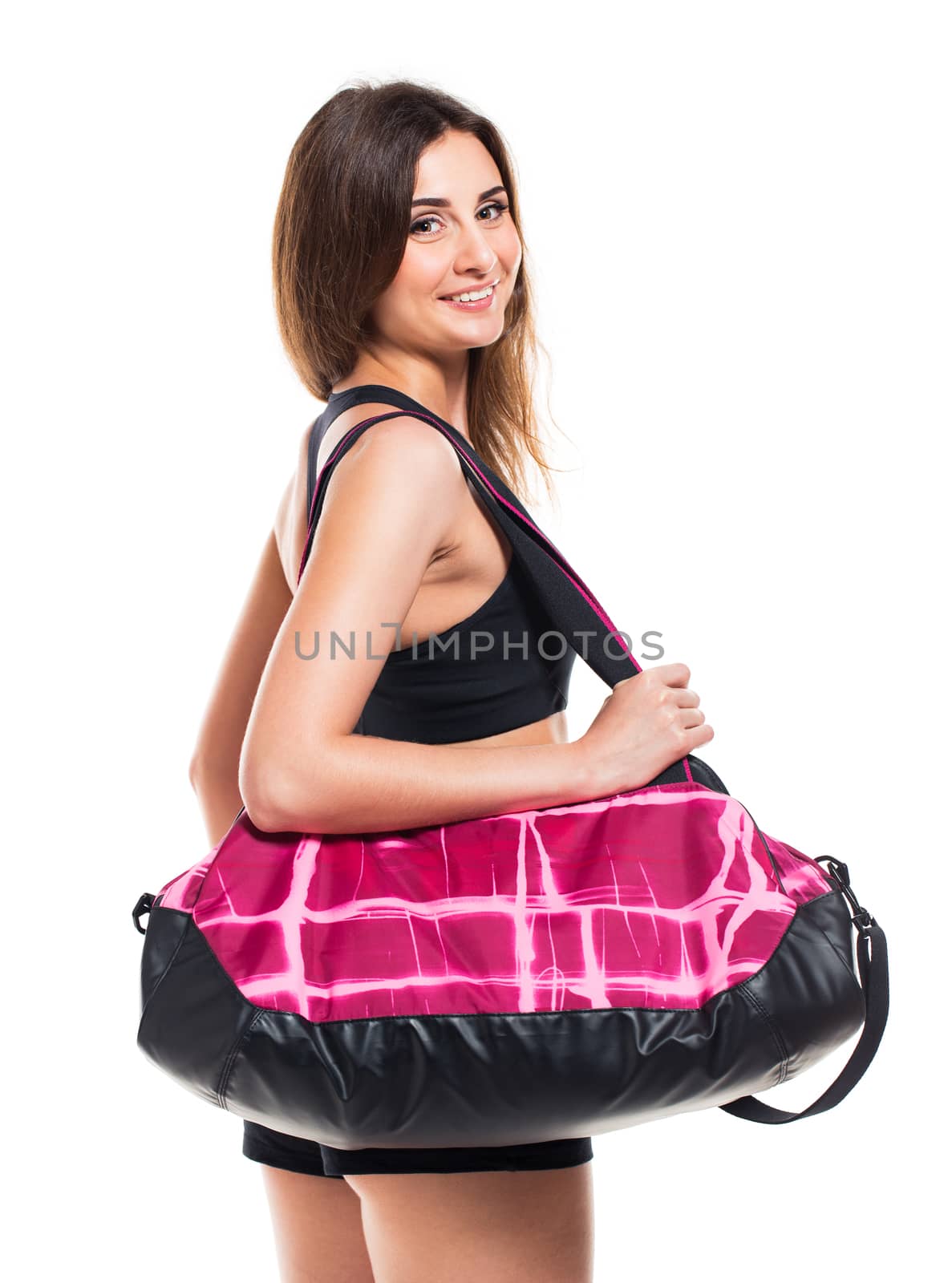 Portrait of attractive caucasian smiling woman with sports bag by vlad_star