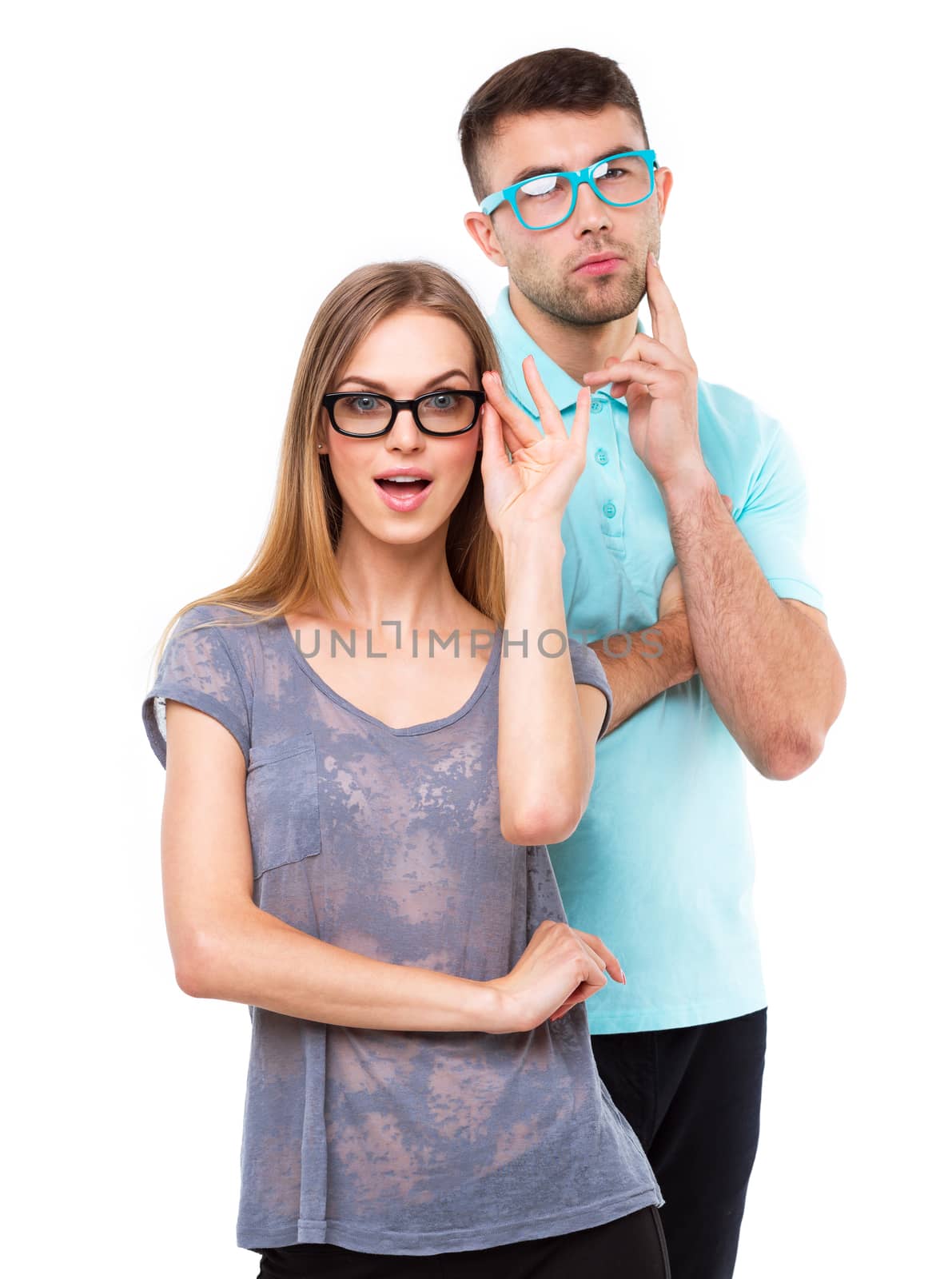 Beautiful young happy couple smiling, man and woman looking at camera, isolated over white background