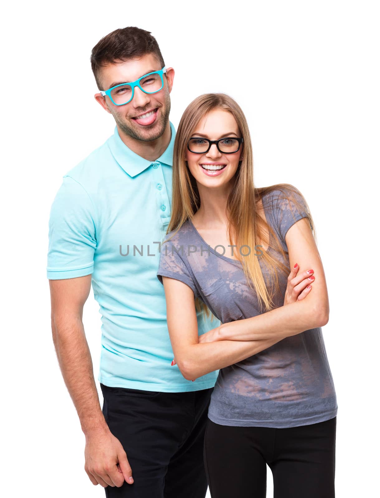 Beautiful young happy couple smiling, man and woman looking at camera, isolated over white background