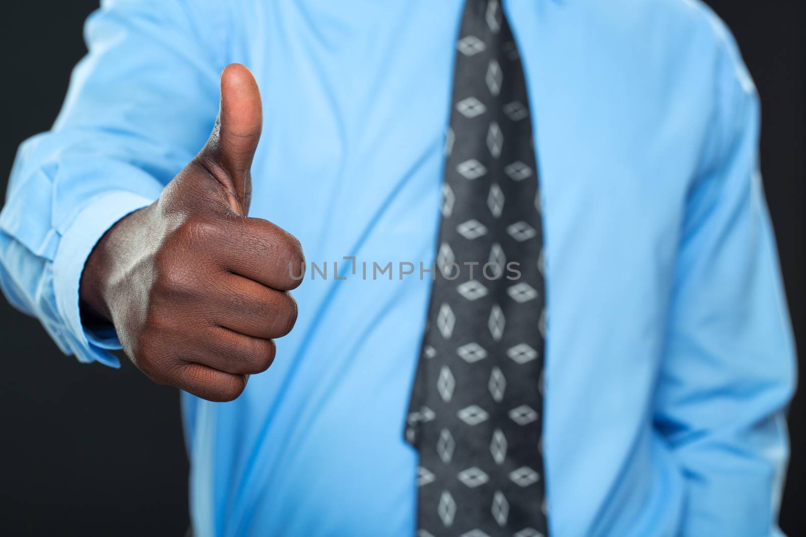 Young successful Businessman Showing Thumb Up