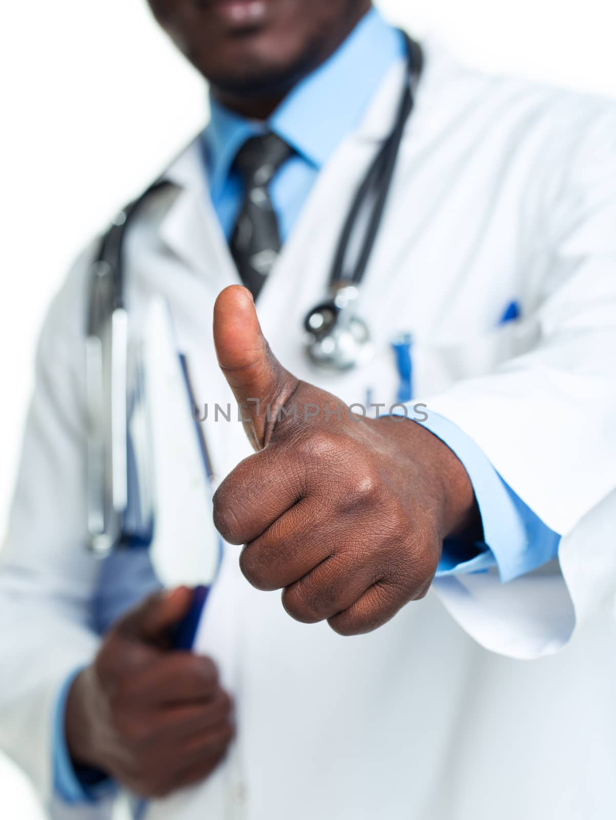 Portrait of a smiling male doctor holding a notepad and finger up on white background