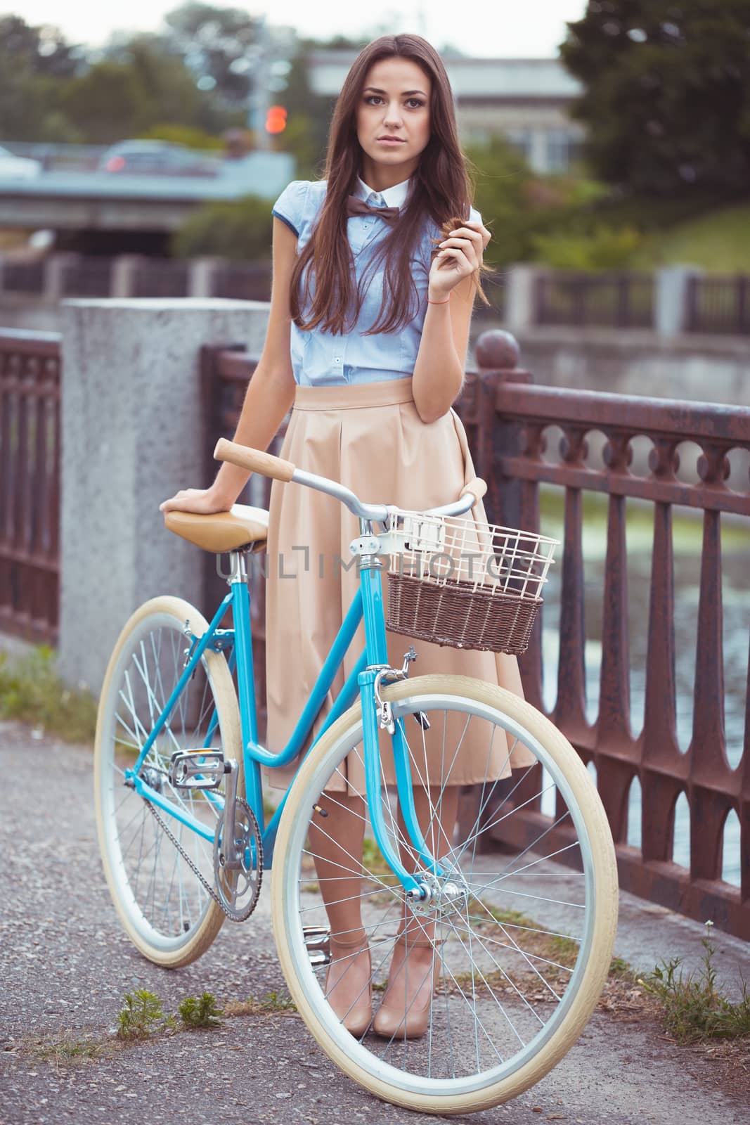 Young elegantly dressed woman with bicycle, summer and lifestyle by vlad_star