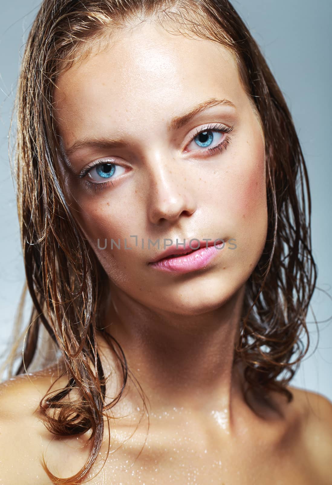 Gorgeous young girl with water drops on her face by vlad_star