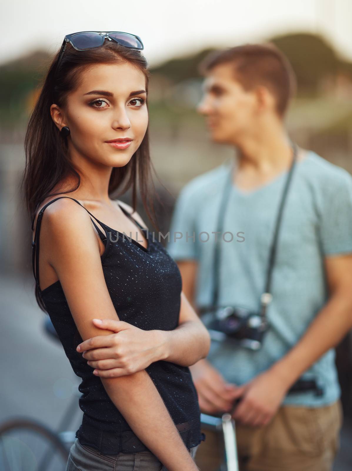 Happy couple with bike in the city by vlad_star