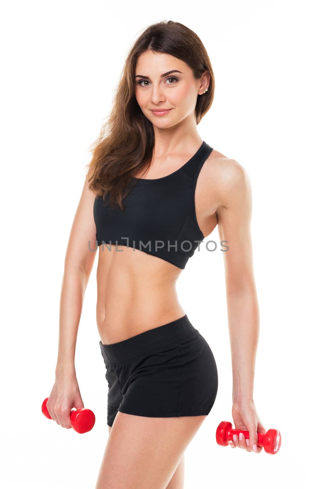 Beautiful slim woman with dumbbells, isolated on white background